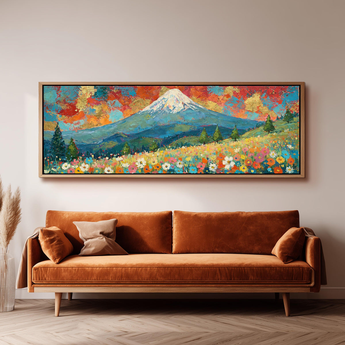 Mount Fuji under a red and gold sunset sky long horizontal canvas print above a sofa in a living room