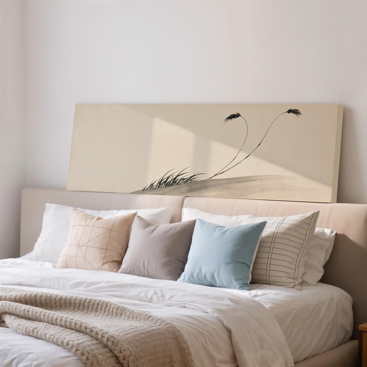 Two birds perched on bending ink reeds wide panoramic canvas print above a bed in a bedroom
