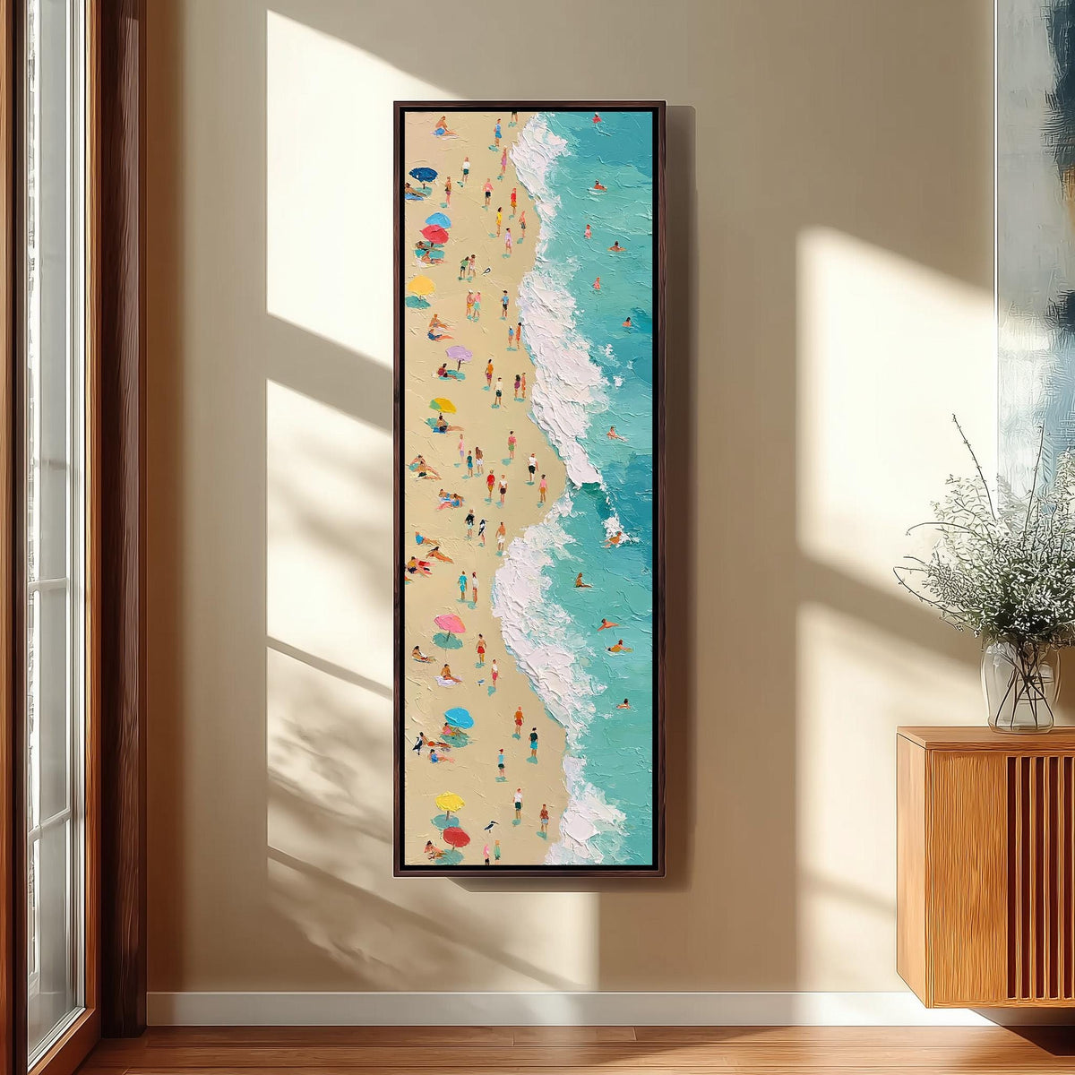 Busy beach and turquoise surf from above tall skinny canvas print in a sunlit living space