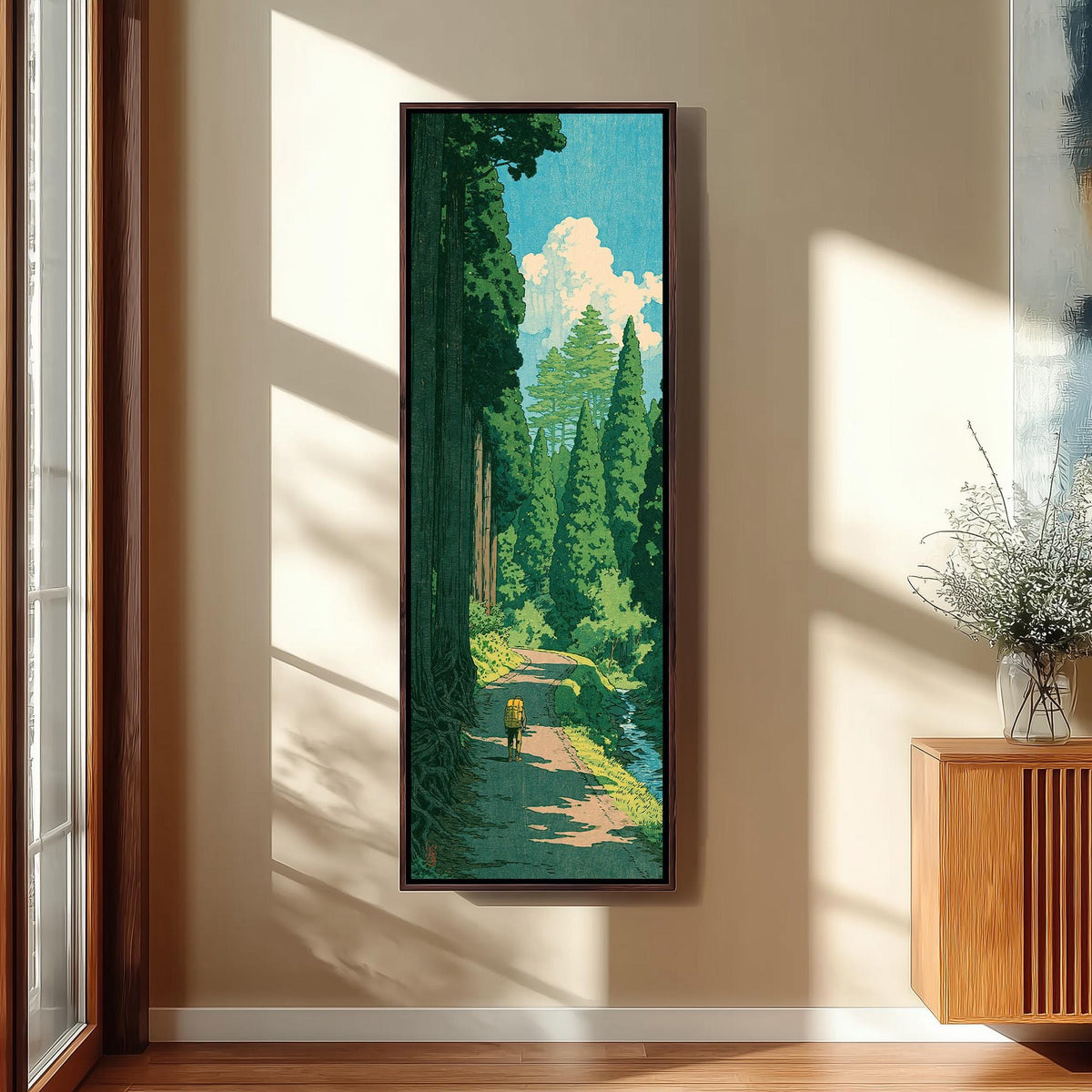 Hiker on a forest trail in a woodblock style long vertical canvas print in a sunlit living space