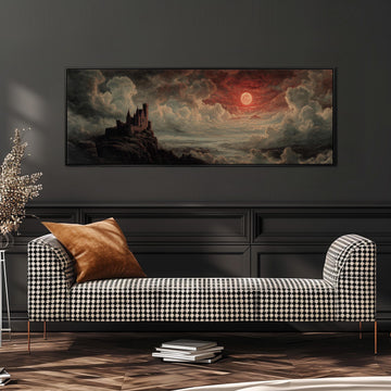a large painting of a castle on a cliff, with a dramatic sky and clouds in the background. The painting is hanging on a wall above a black and white checkered sofa, which has a brown throw pillow on it. There are also some books on the floor in front of the sofa.