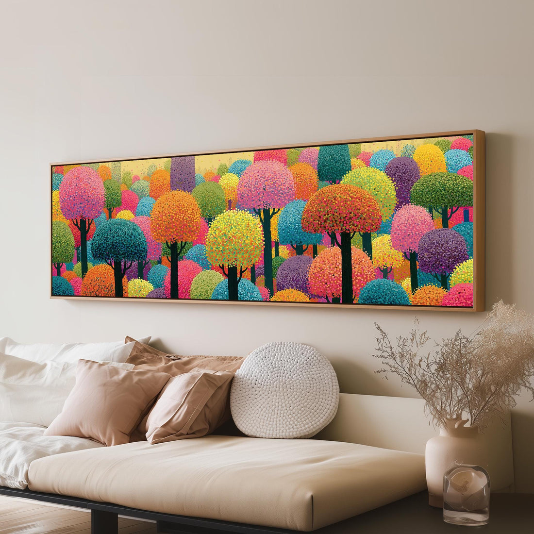 Rainbow pointillist forest long horizontal canvas print above a sofa in a living room