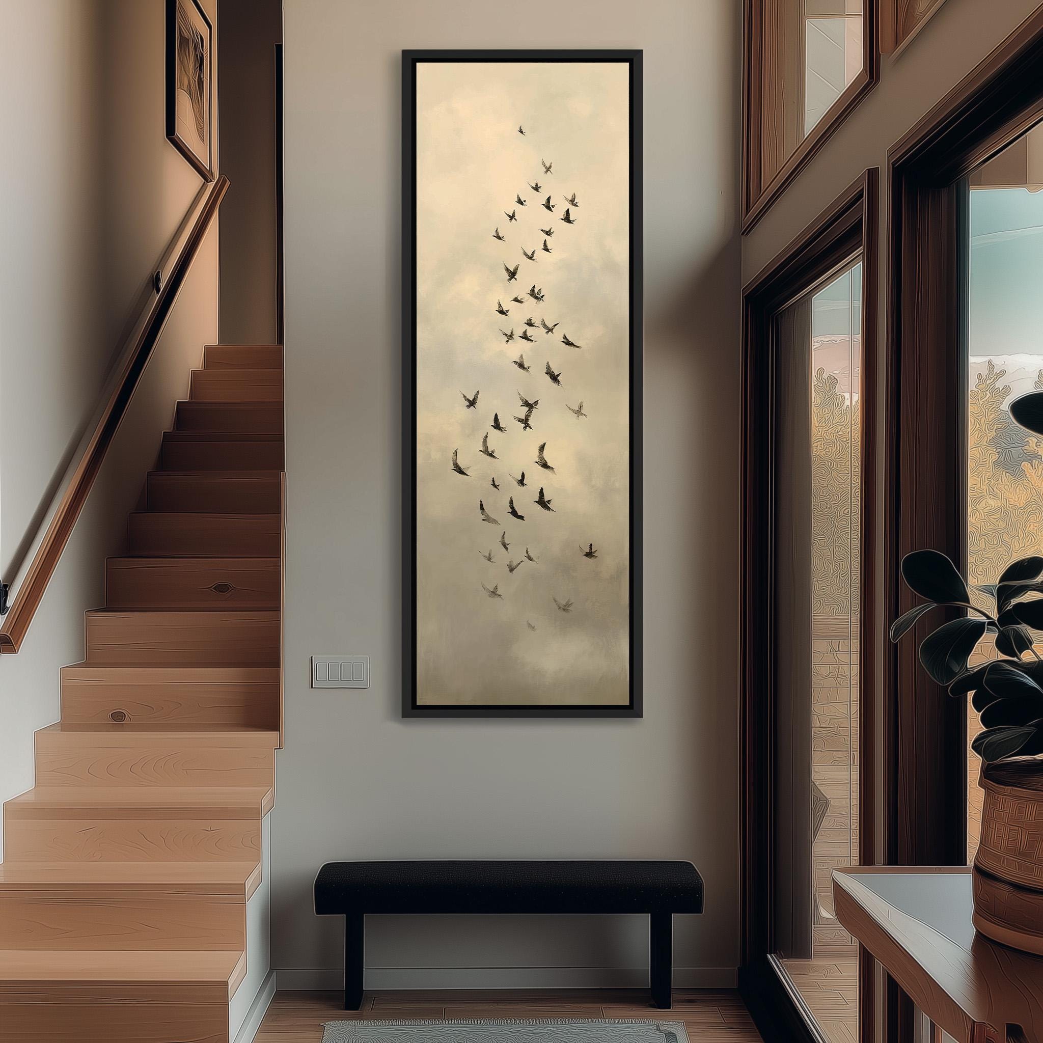 a hallway with a large painting of birds in flight hanging on the wall. The painting is framed and appears to be the focal point of the space.