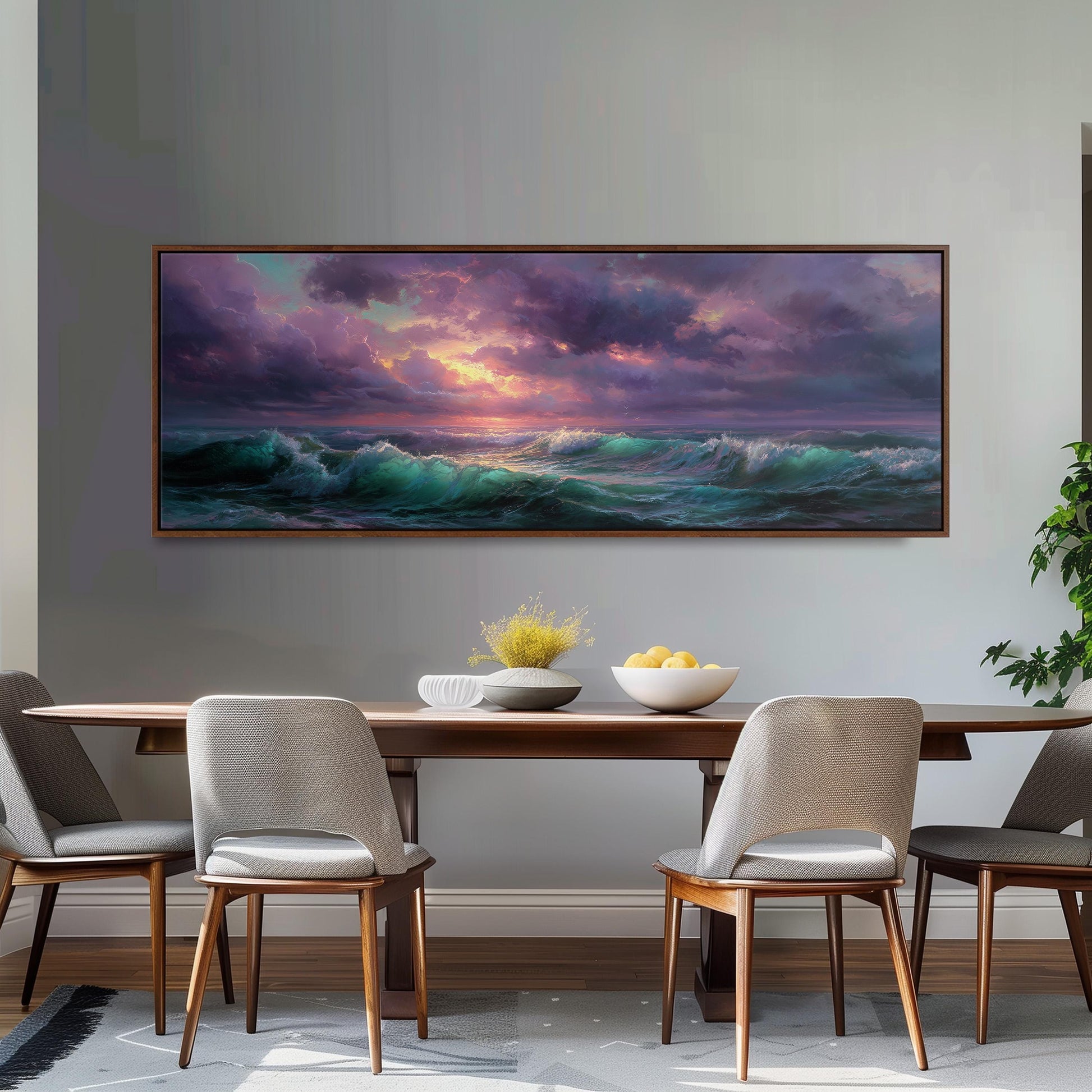 a large painting of a stormy ocean scene hanging on a wall above a wooden dining table with four chairs.