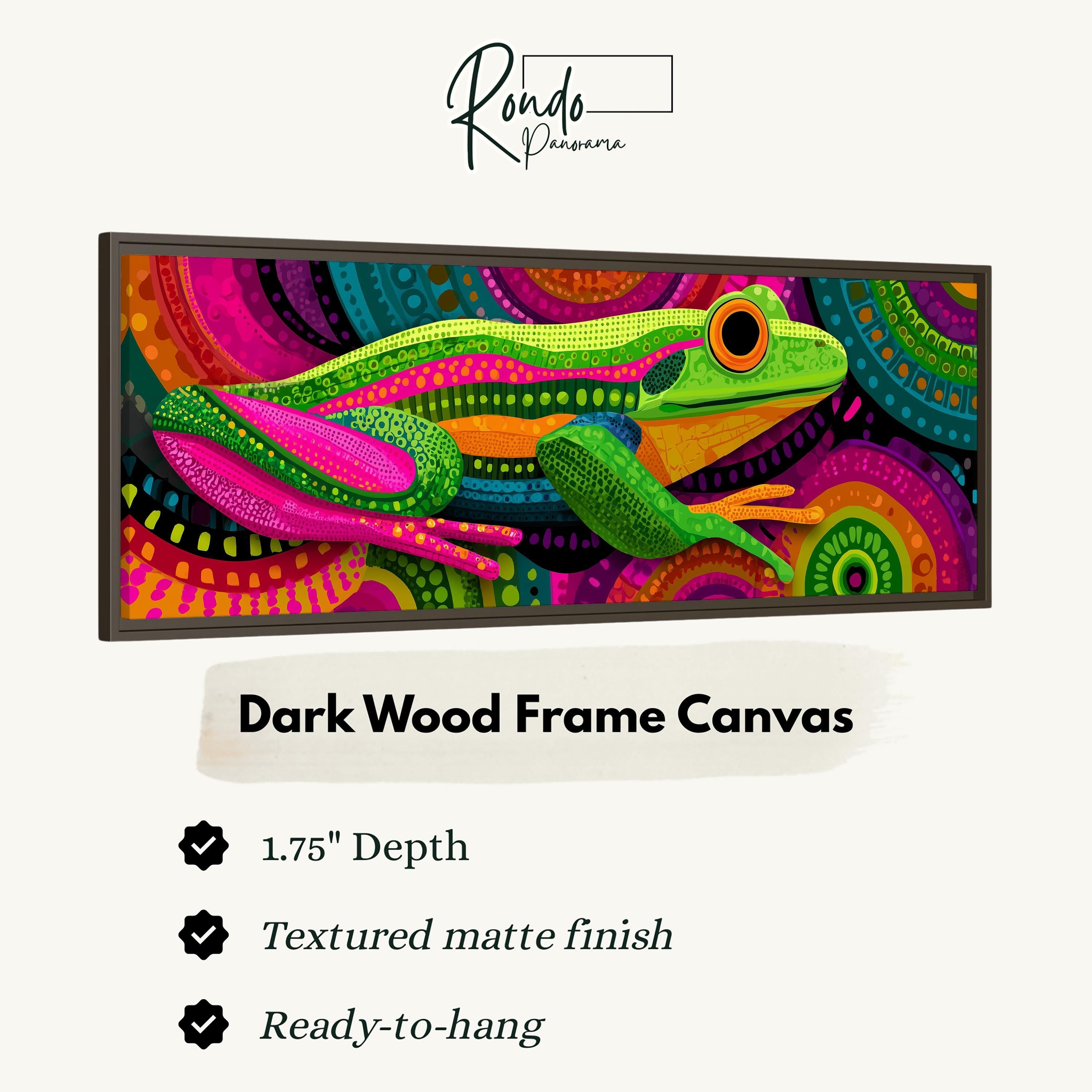 The image is a vibrant, colorful painting of a frog, which is a dark wood frame canvas.