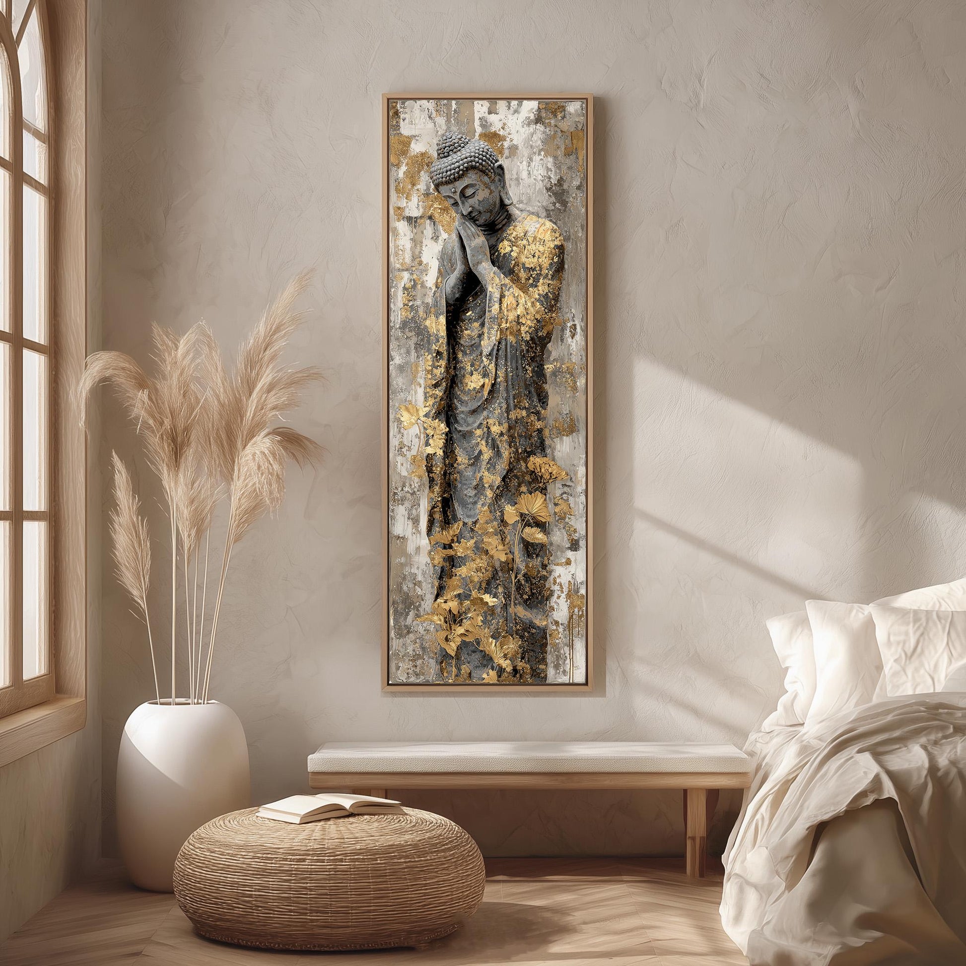 a large Buddha statue with golden leafy patterns on its robe, displayed on a wall in a minimalist living room setting.