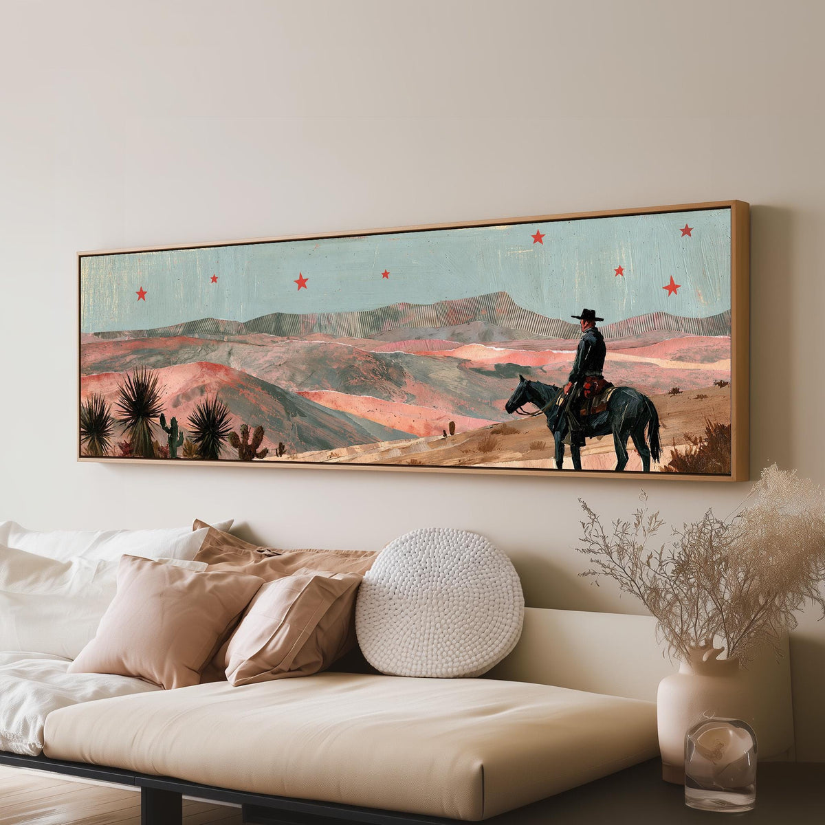 Desert cowboy under red stars panoramic canvas print above a sofa in a living room