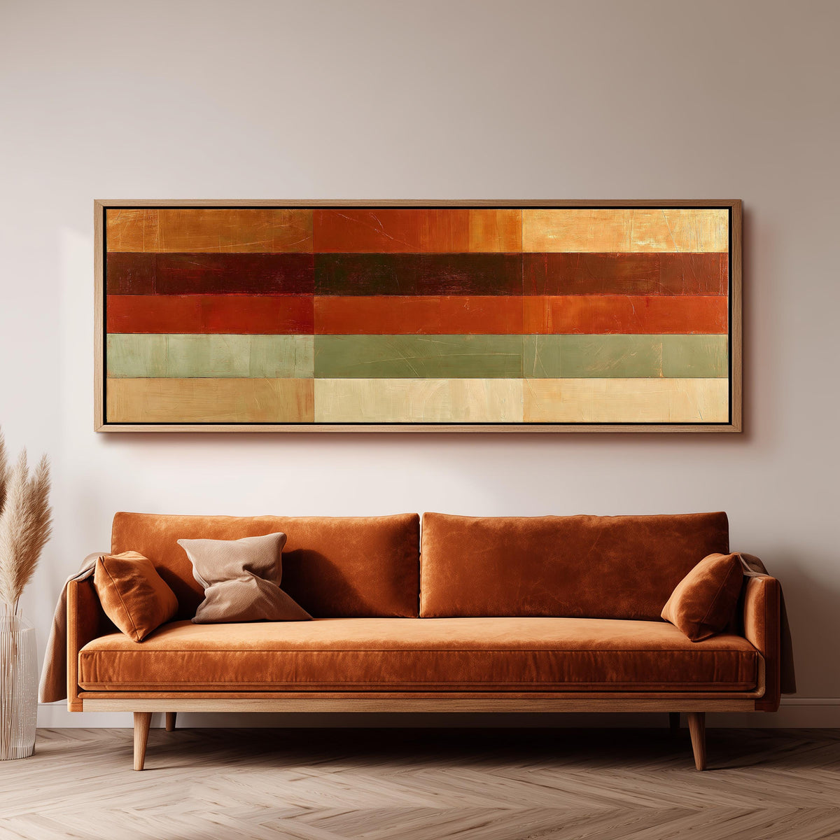 Amber, rust and sage horizontal color bands long horizontal canvas print above a sofa in a living room