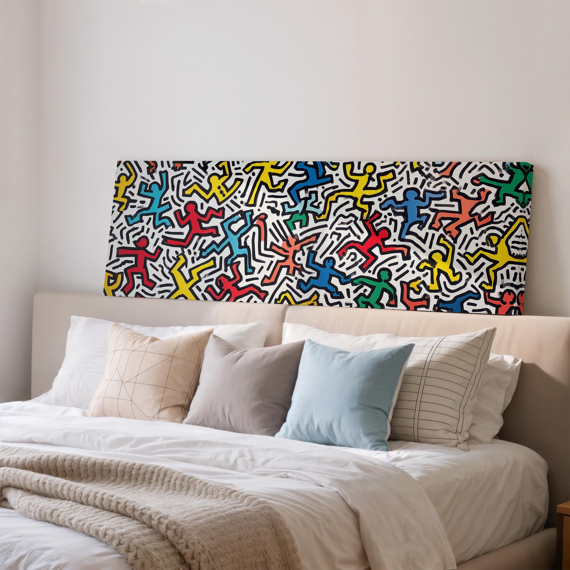 a large, colorful abstract painting hanging on a wall above a bed with white bedding and pillows.