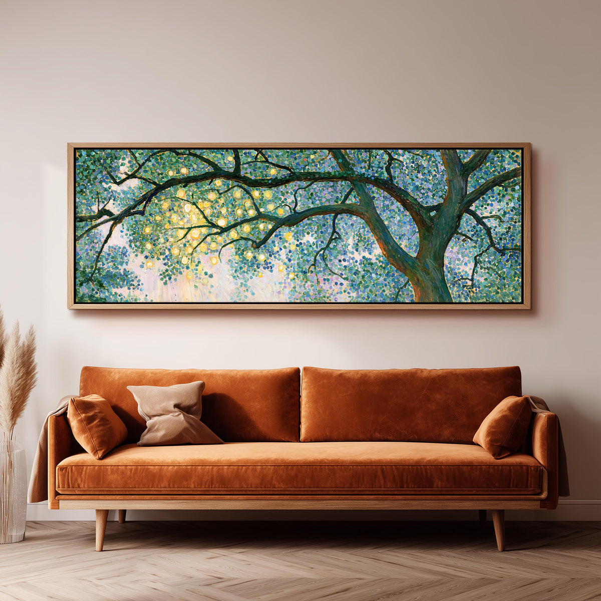 Tree canopy with golden light long horizontal canvas print above a sofa in a living room