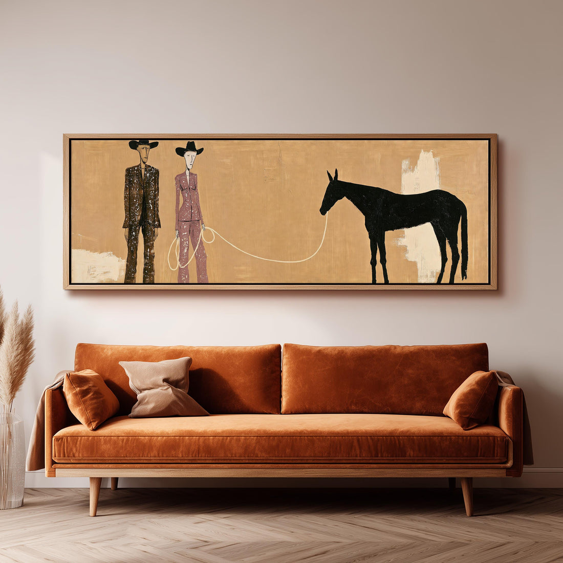 Stylized cowboy and cowgirl with a horse long horizontal canvas print above a sofa in a living room