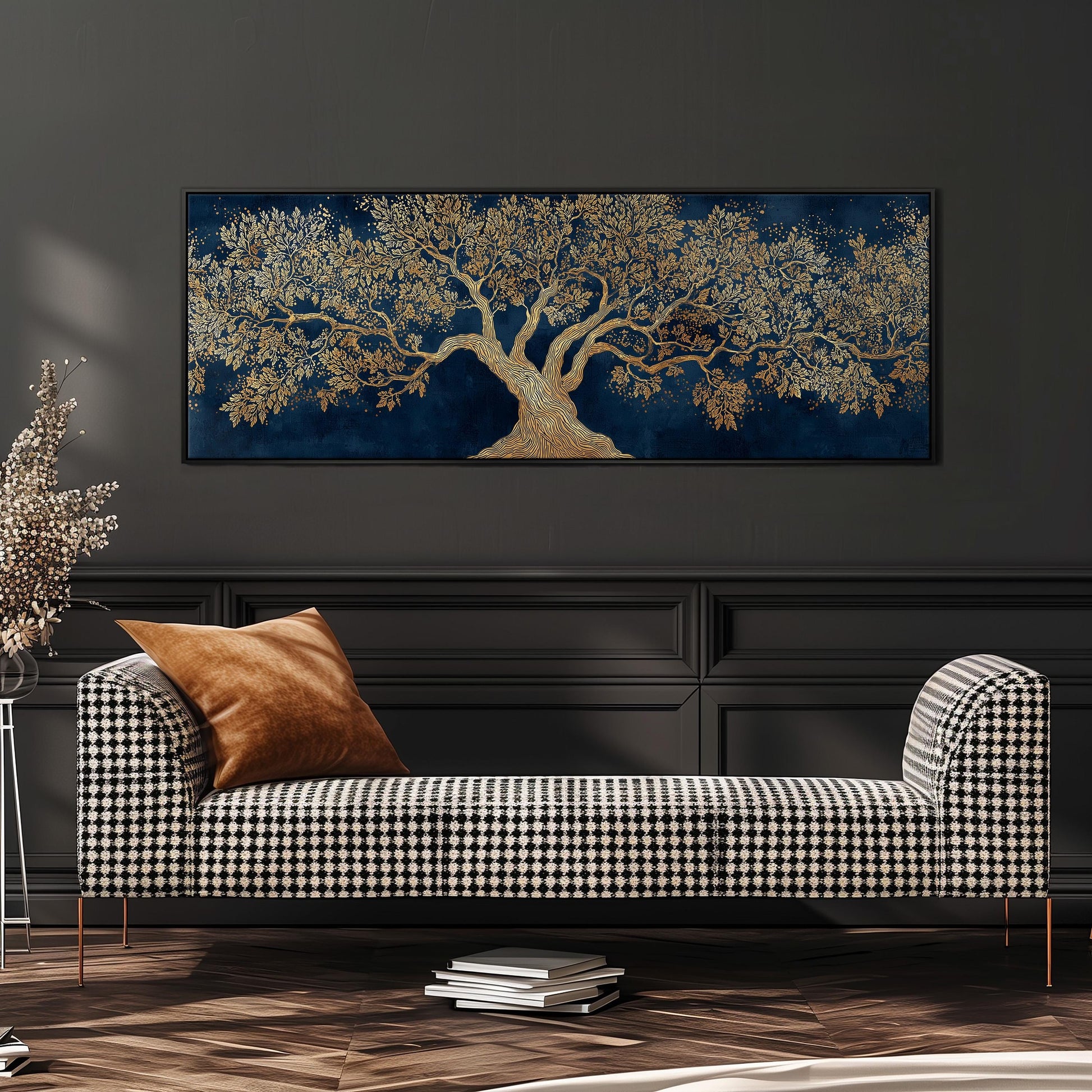 a large, ornate tree painting hanging on a dark wall above a black and white checkered sofa with a brown throw pillow.