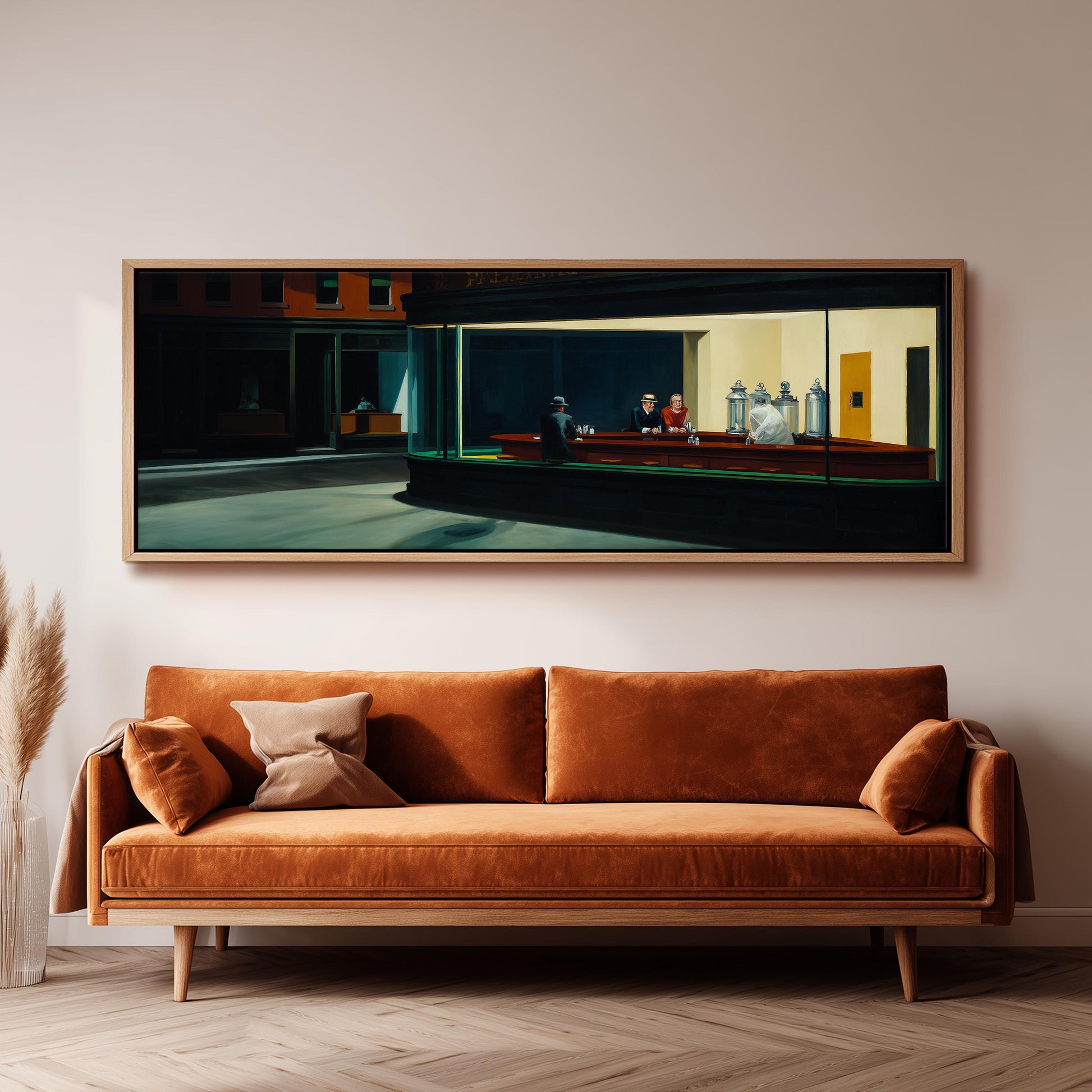 a large, framed painting of a bar scene hanging on a wall above a brown sofa.