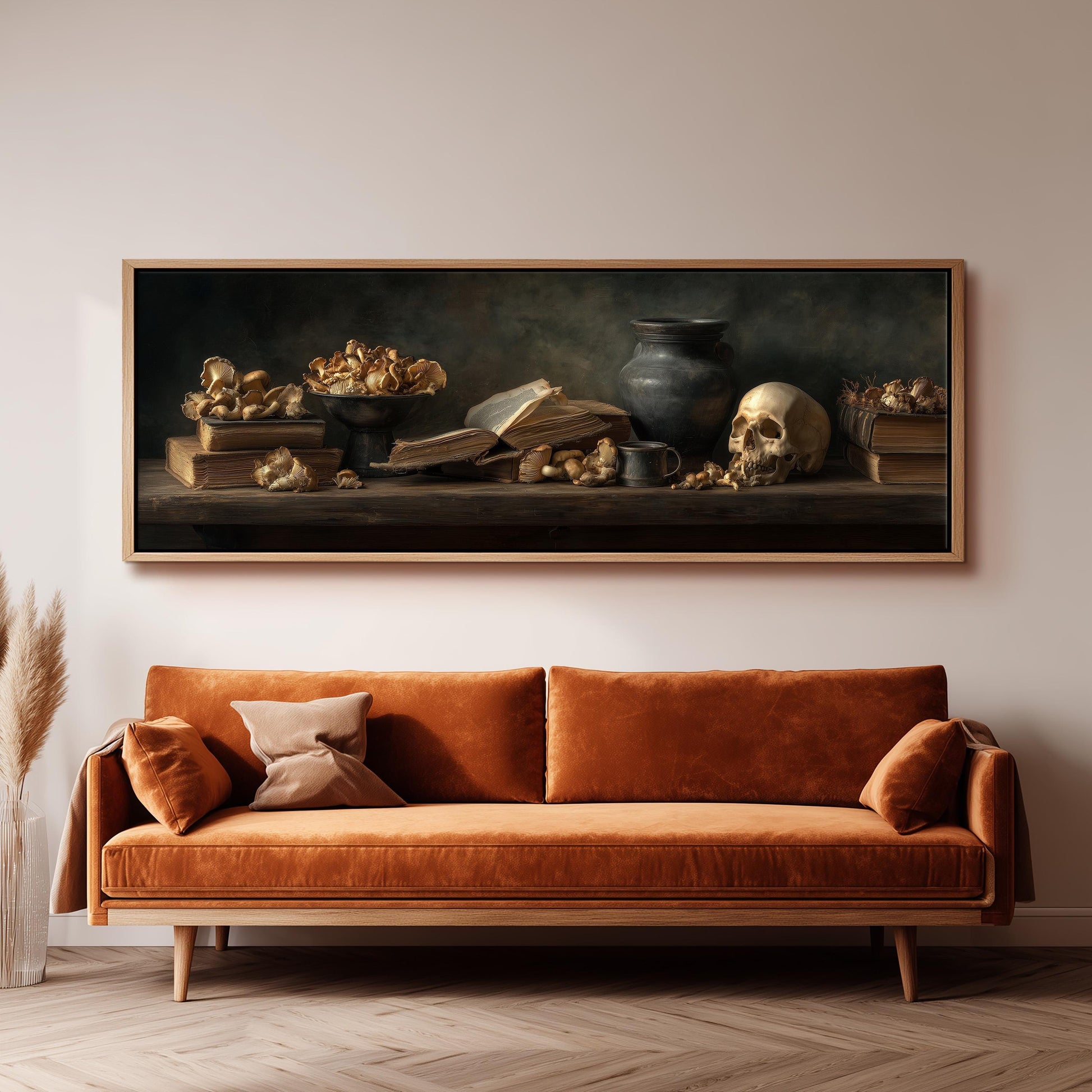 a large painting of a still life arrangement on a wall above a brown sofa.