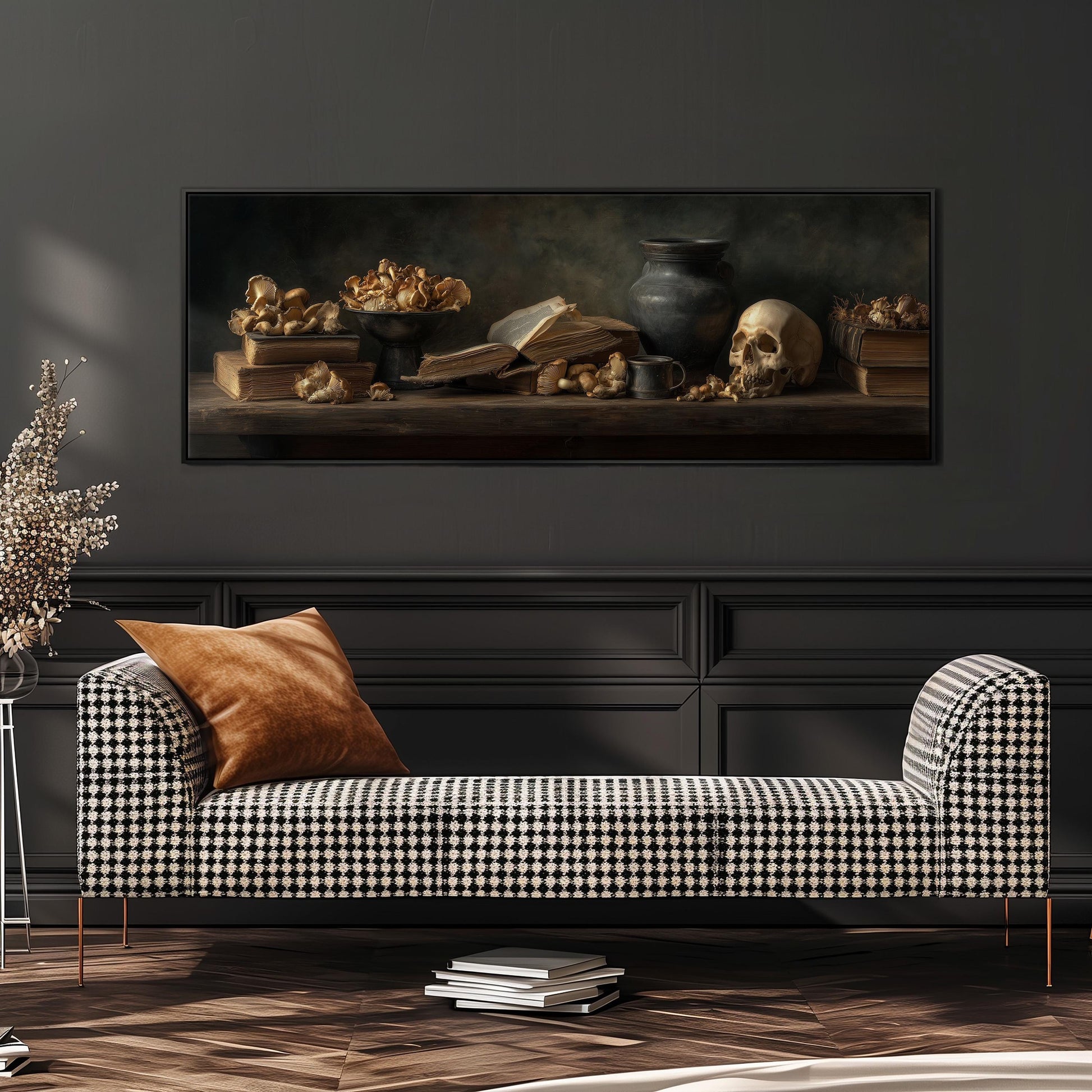 a black and white checkered sofa with a brown throw pillow, set against a dark wall with a large framed painting of a still life arrangement above it.