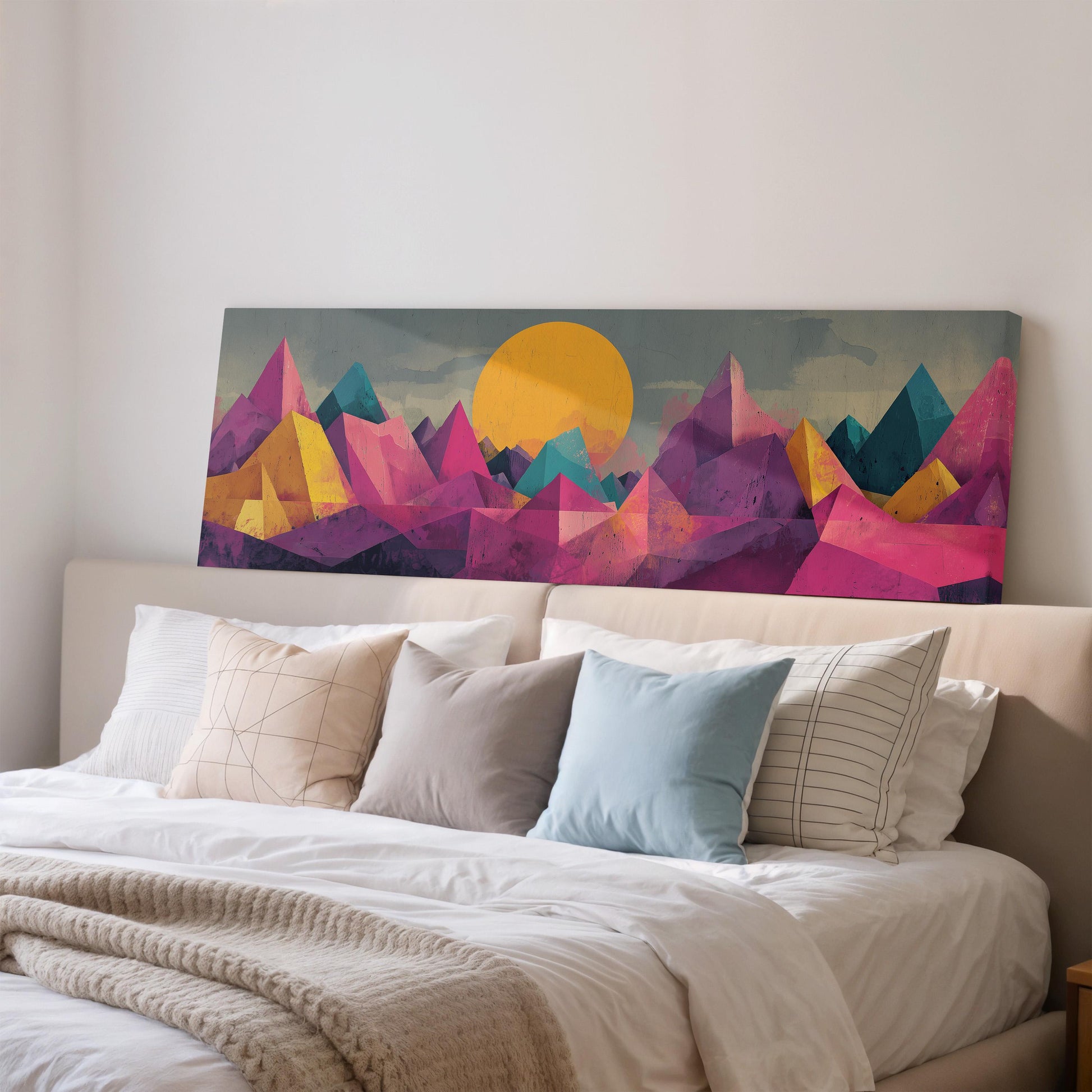 a large, colorful painting of mountains on the wall above a bed with white bedding and pillows.