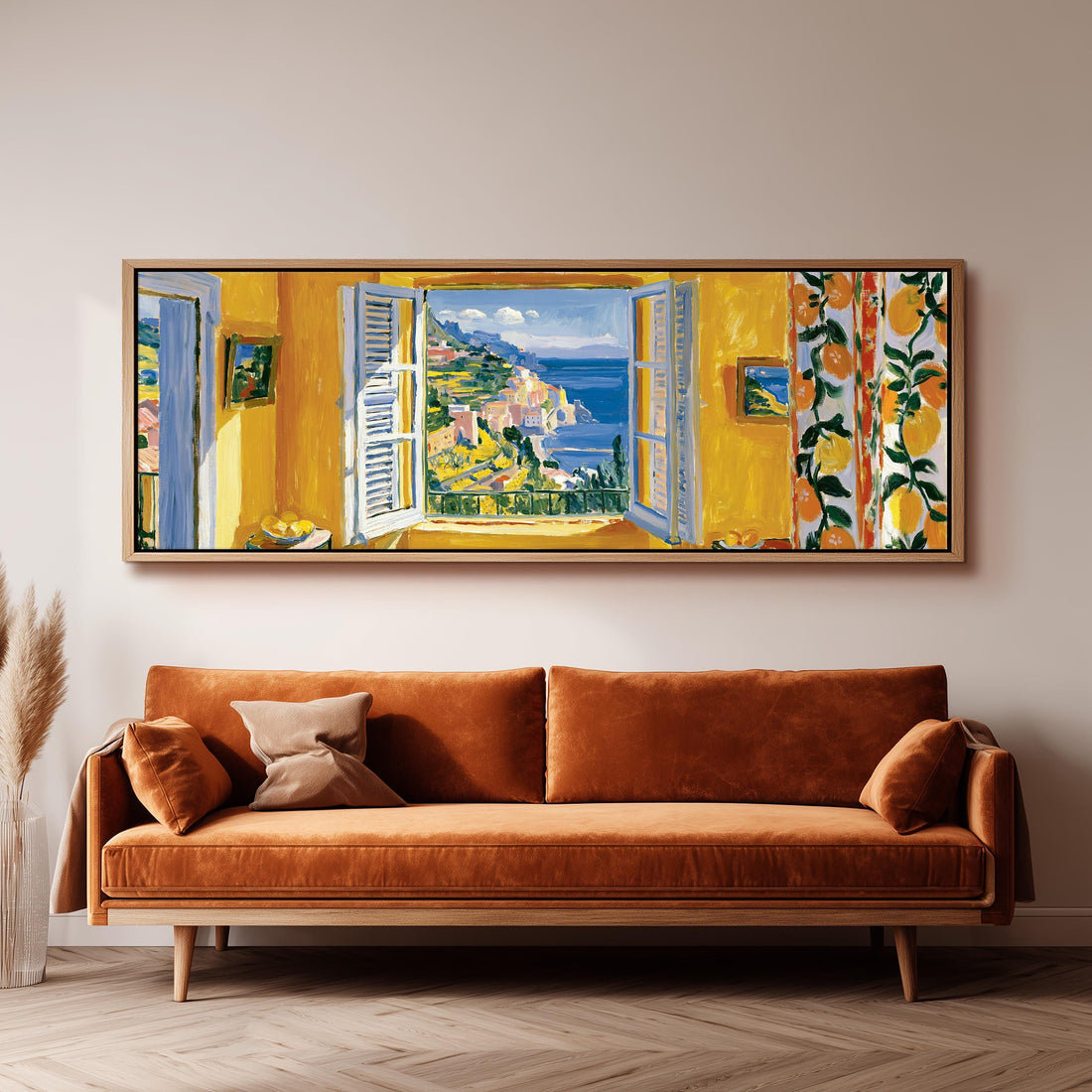 Amalfi Coast through a lemon-patterned window long horizontal canvas print above a sofa in a living room
