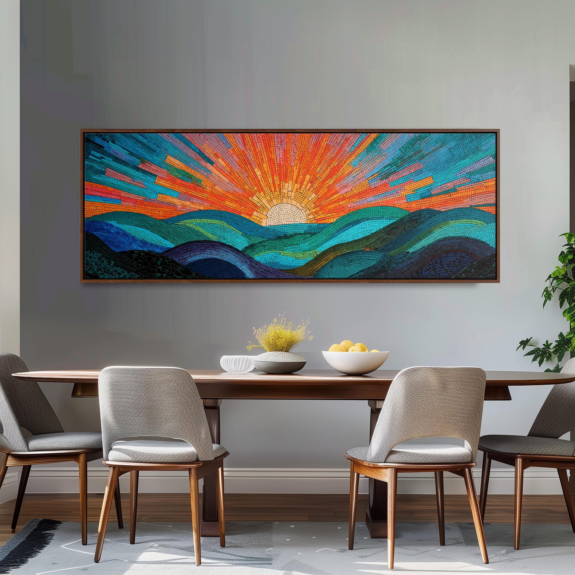 a dining room with a large, colorful painting of a sunrise over a mountain landscape hanging on the wall above a wooden dining table. The table is set with a bowl of fruit and a vase of flowers, creating a warm and inviting atmosphere.