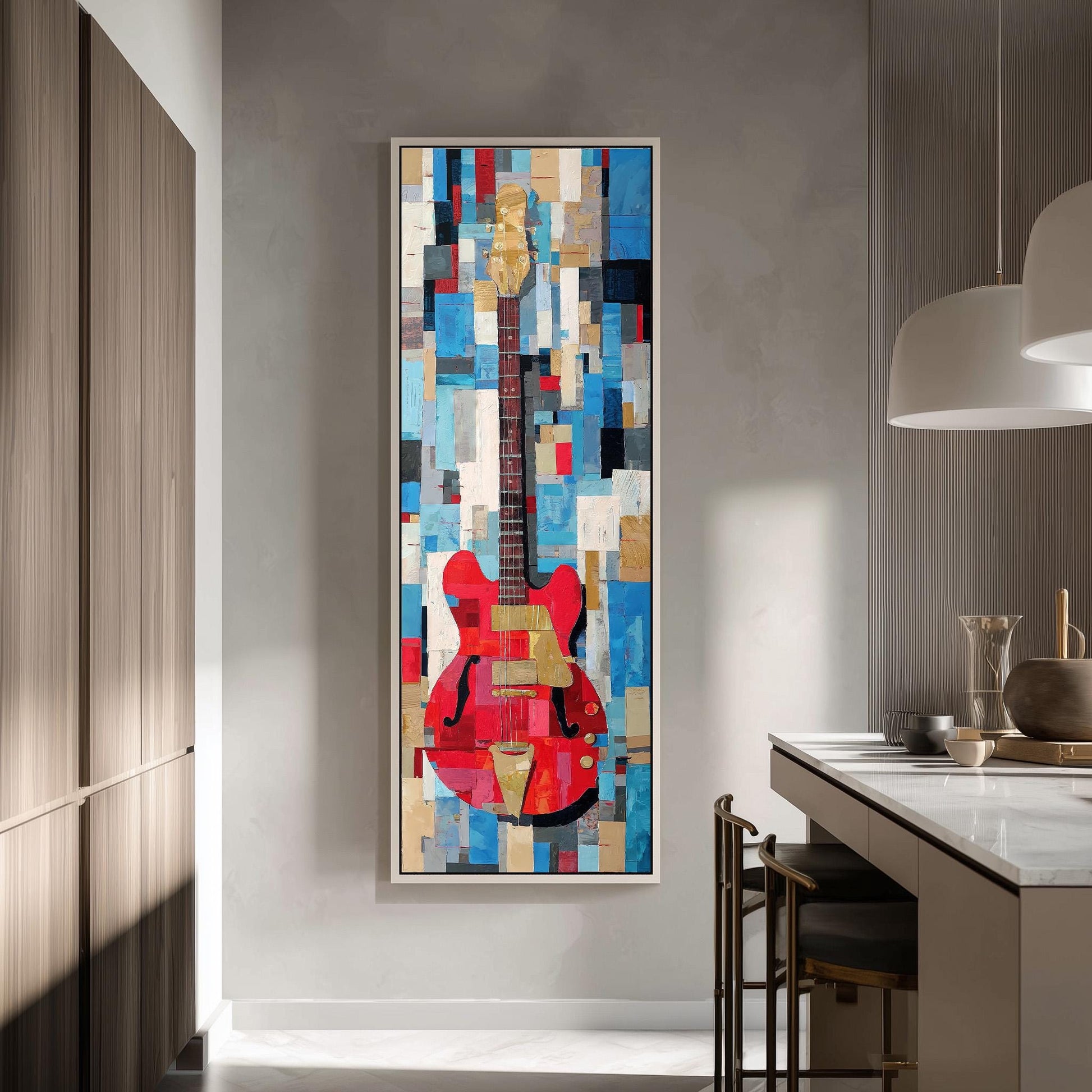 a large, colorful abstract painting of a guitar hanging on a wall in a modern kitchen.
