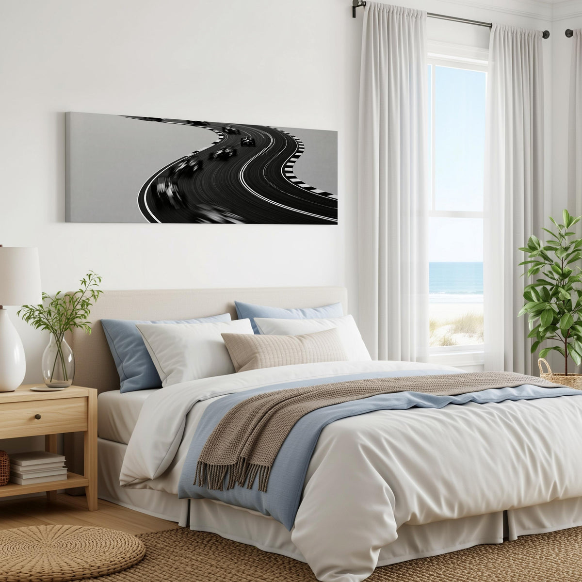Winding race track in monochrome panoramic canvas print above a bed in a coastal bedroom