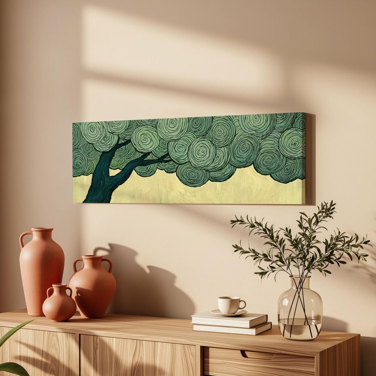 Tree with a swirling green canopy long horizontal canvas print above a wooden sideboard