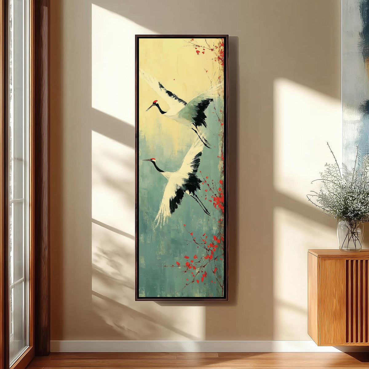 Pair of red-crowned cranes in flight long vertical canvas print in a sunlit living space