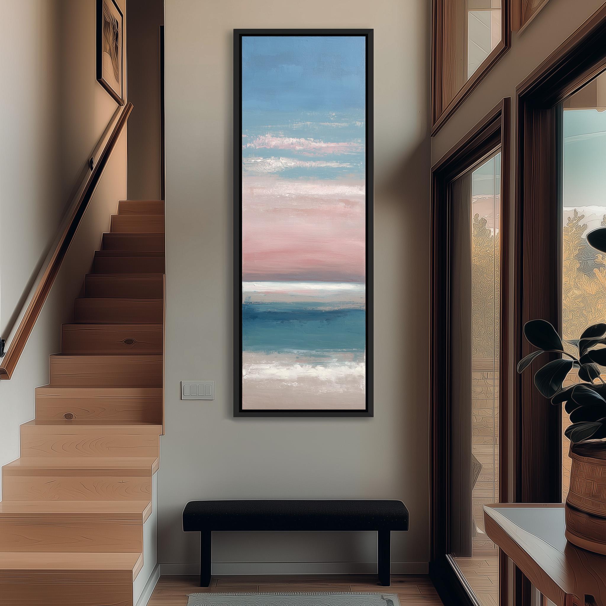 a hallway with a large painting of a seascape hanging on the wall. The painting is framed in black and is positioned above a black bench. The hallway has wooden stairs leading up to the painting, and there is a window on the right side of the image.