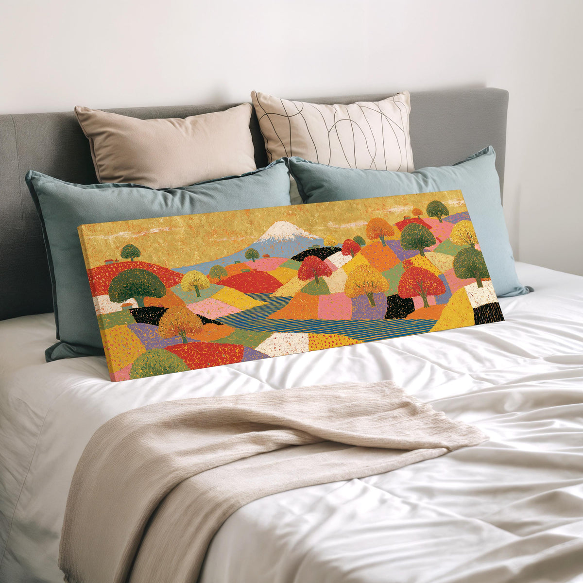 Mount Fuji over golden patchwork hills wide panoramic canvas print laid on a bed to show its size