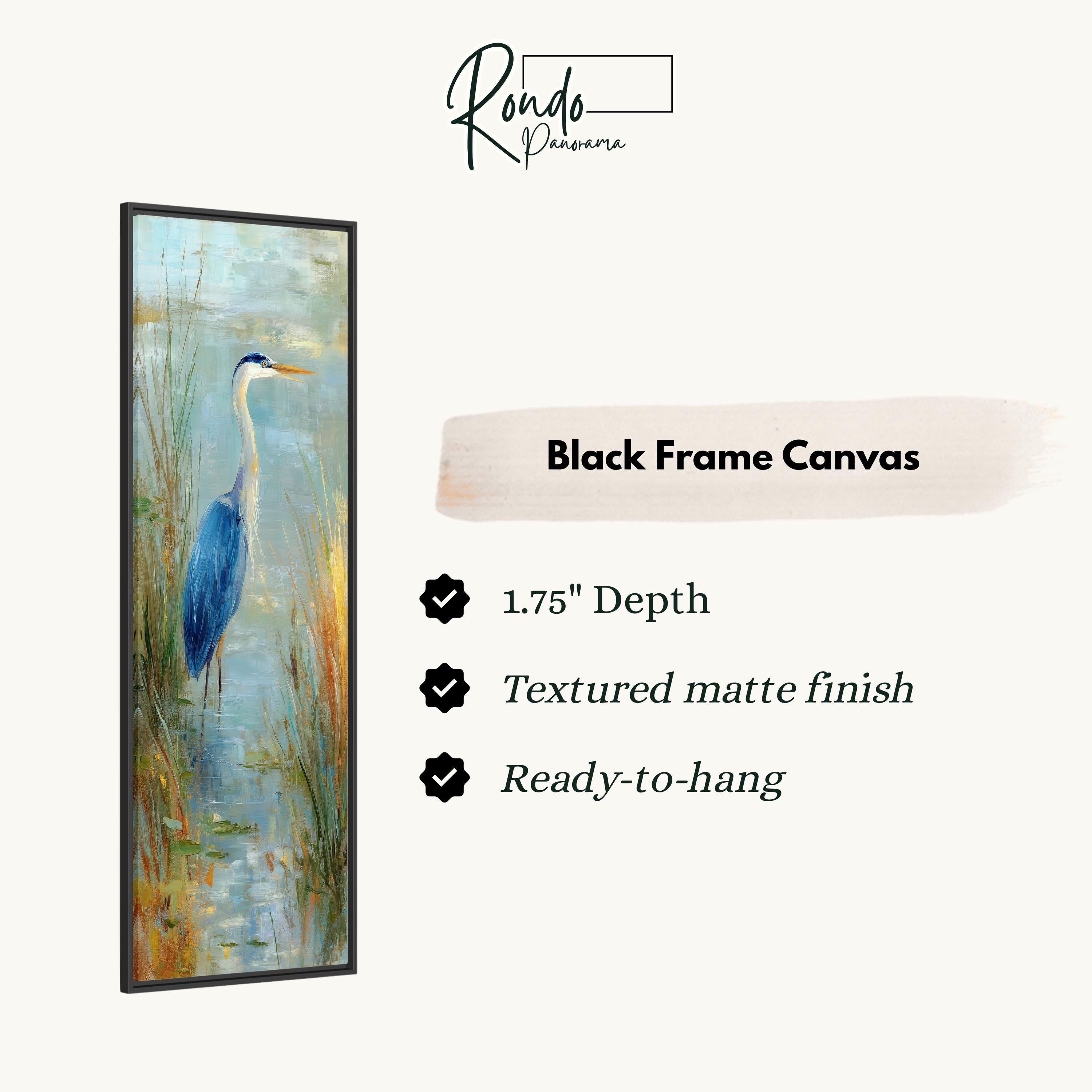 The image is a black frame canvas featuring a painting of a blue heron standing in a pond.