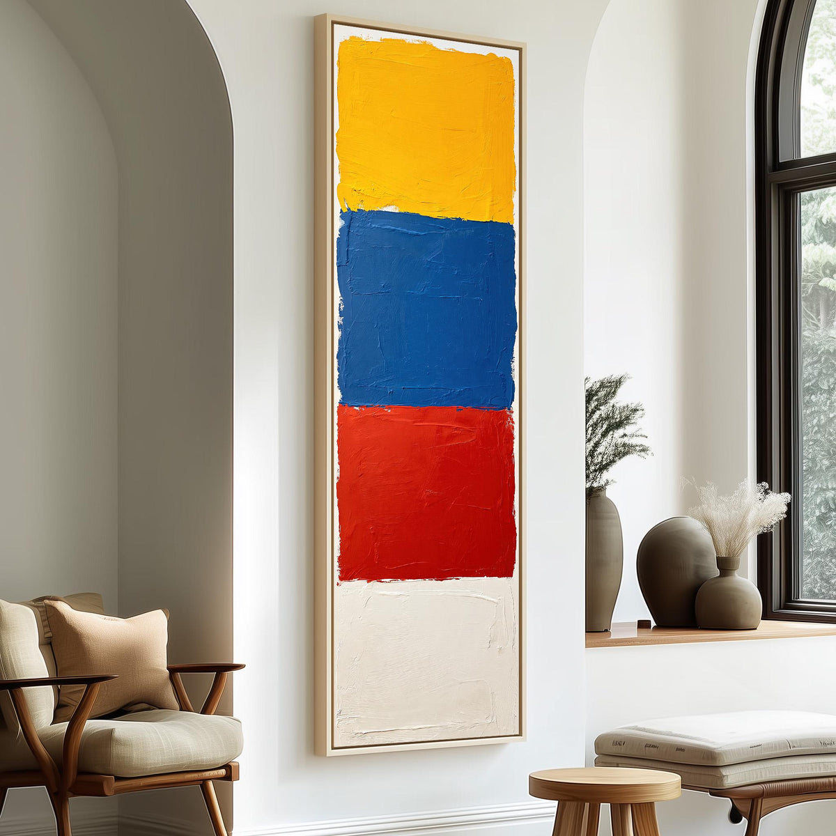 Color field blocks in yellow, blue and red long vertical canvas print in a sunlit living space