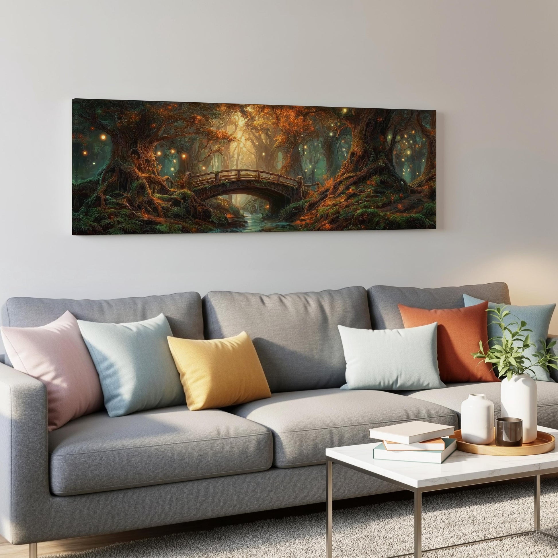 a large, colorful painting of a forest scene hanging on a wall above a gray couch with colorful throw pillows.