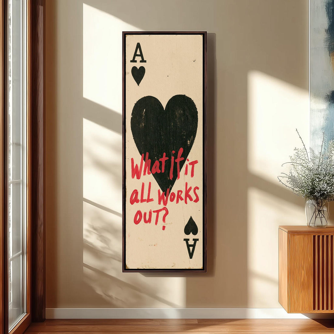 Ace of hearts with the quote what if it all works out long vertical canvas print in a sunlit living space