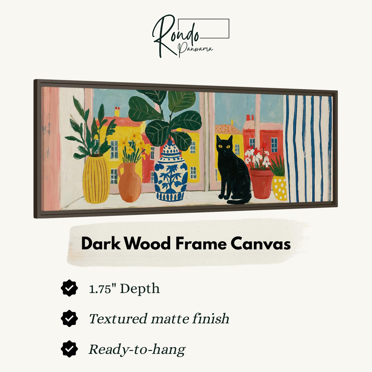 Black cat on a windowsill overlooking a colorful village canvas print in a dark wood floating frame