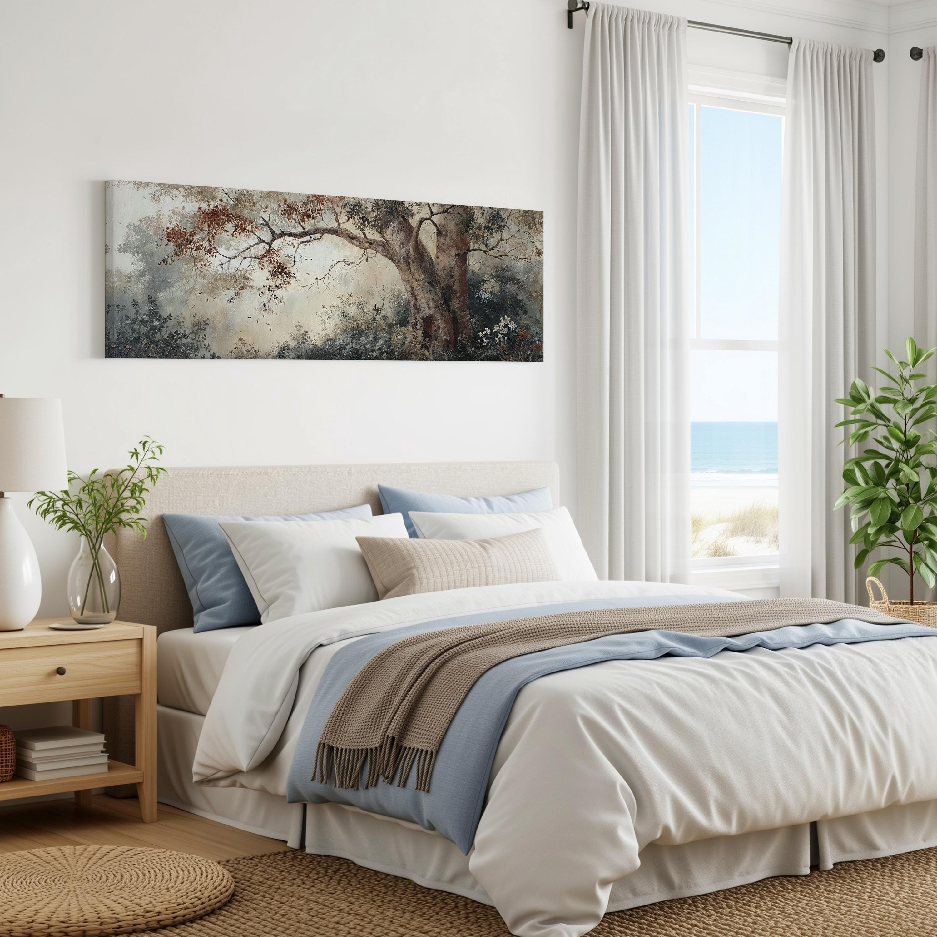 a serene bedroom with a large bed, a painting of a tree on the wall, and a window overlooking the ocean.