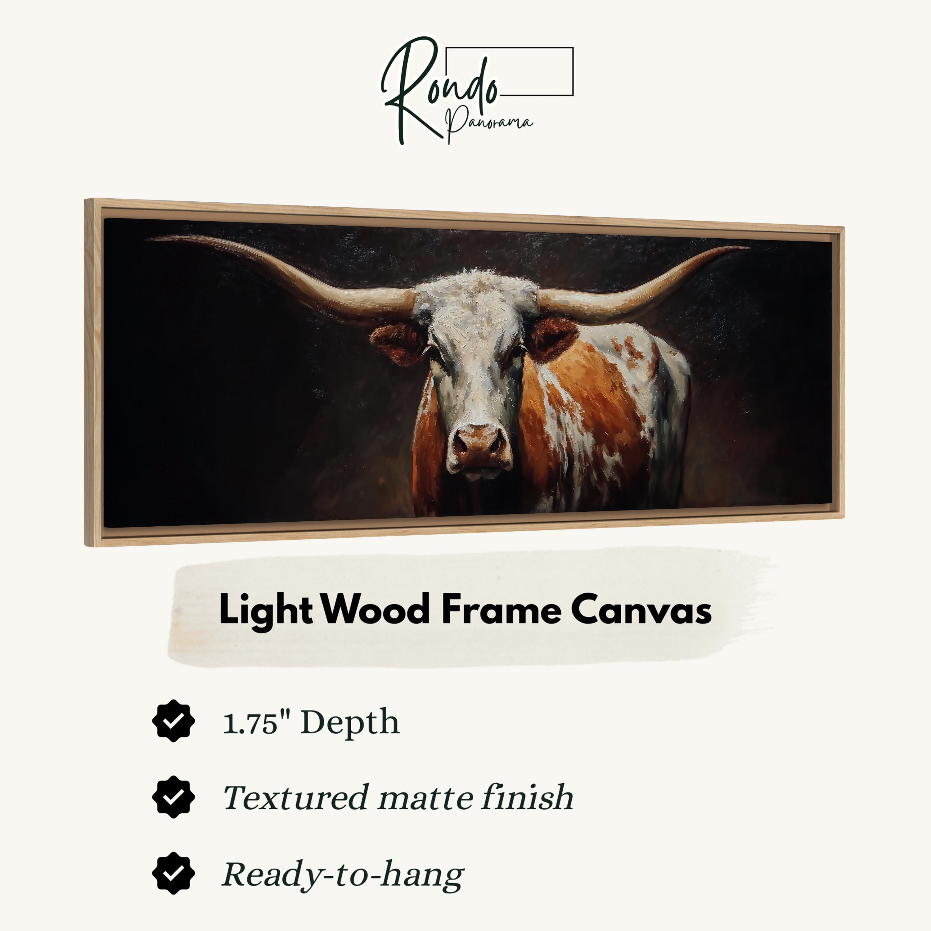 a close-up of a bull with long horns, displayed in a light wood frame canvas.