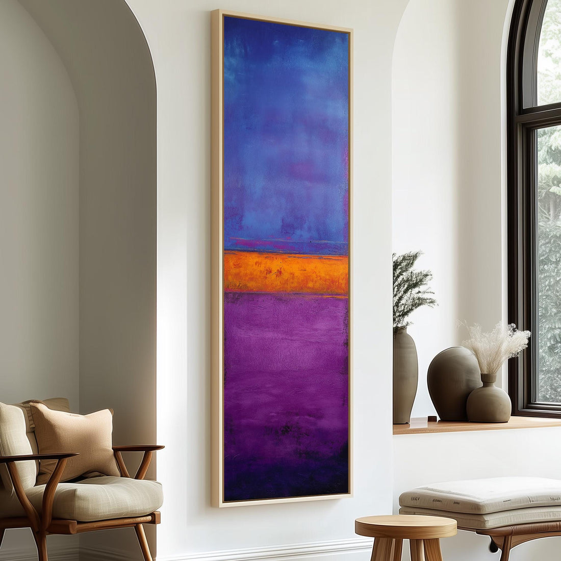 a modern hallway with a large, colorful abstract painting hanging on the wall. The painting has a vibrant mix of blue, purple, and orange colors, creating a striking visual focal point in the space. The hallway also includes a wooden staircase, a bench, and a potted plant, contributing to the overall aesthetic and design of the room.