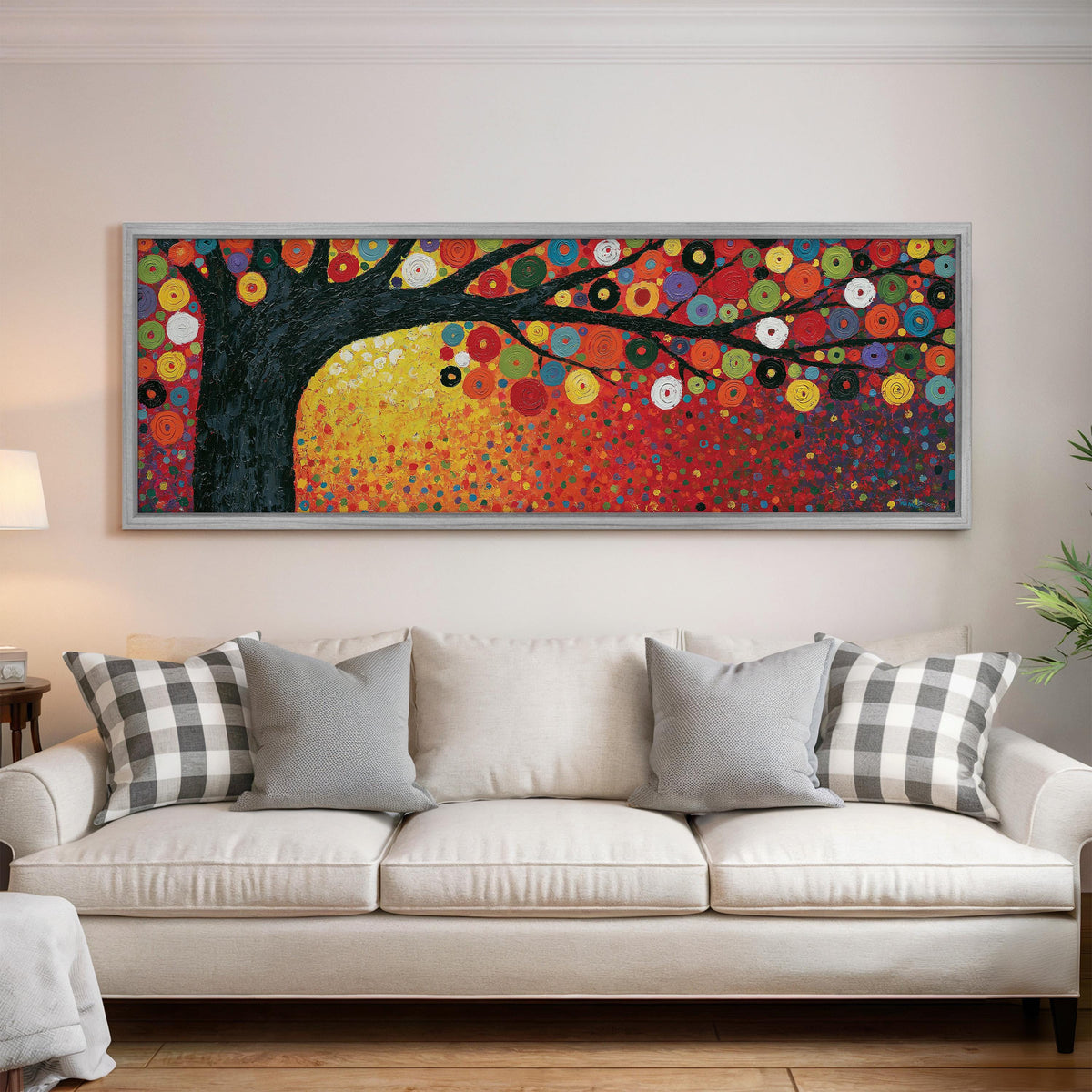 Amber tree of life in a Klimt style panoramic canvas print above a white sofa in a bright living room