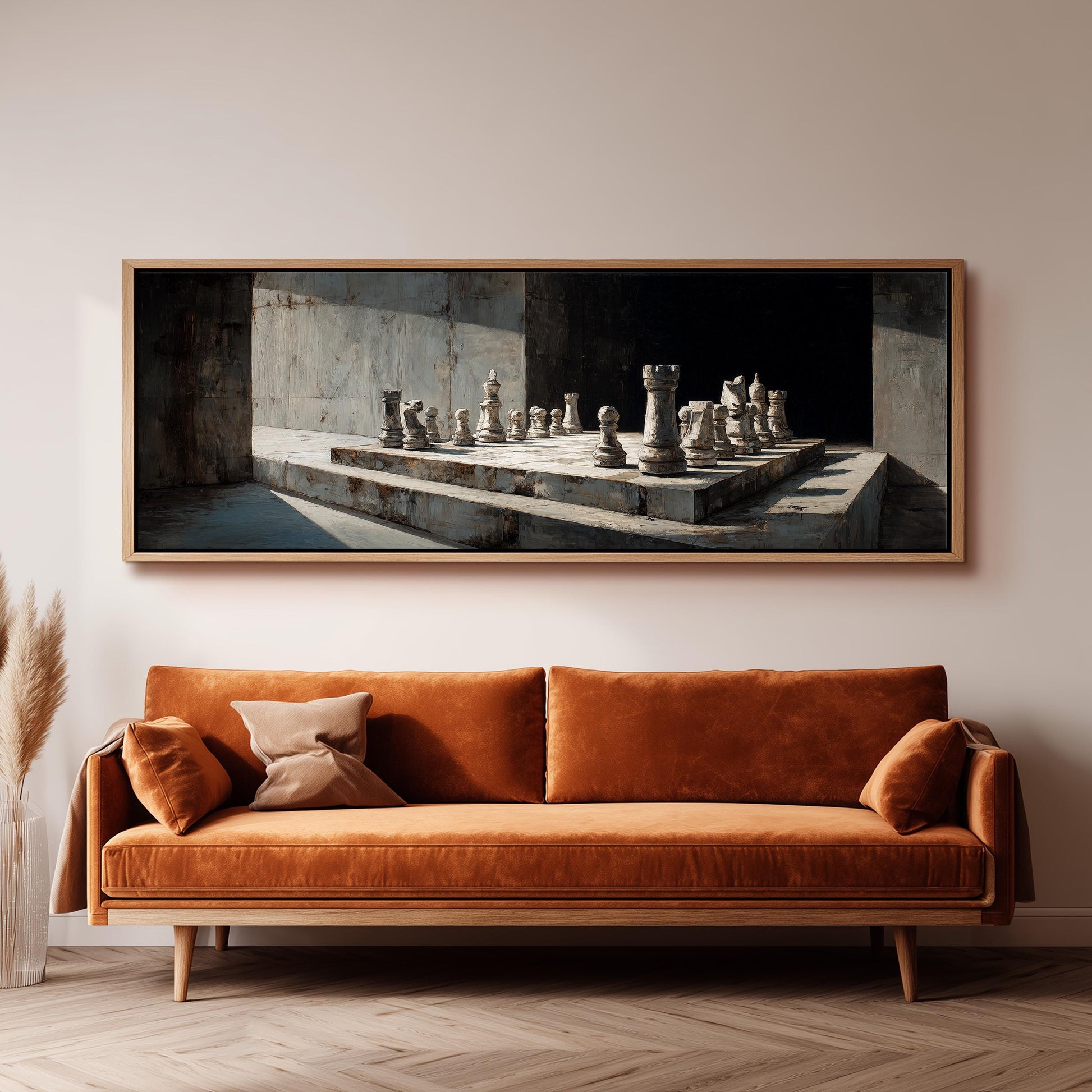 a large, framed painting of a chessboard hanging on a wall above a brown sofa.