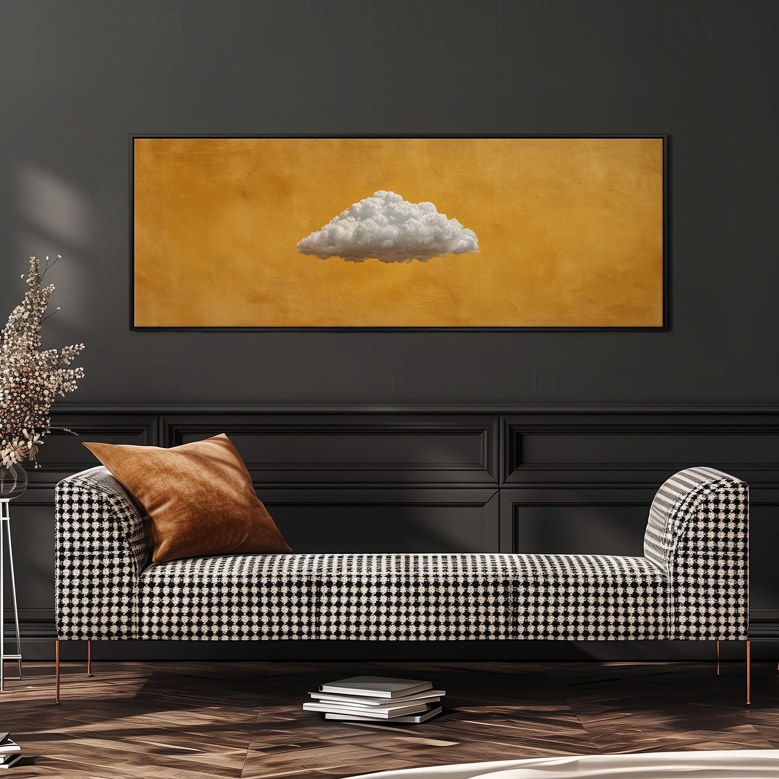 a black and white checkered sofa with a brown throw pillow, set against a dark wall with a framed artwork of a cloud on it.