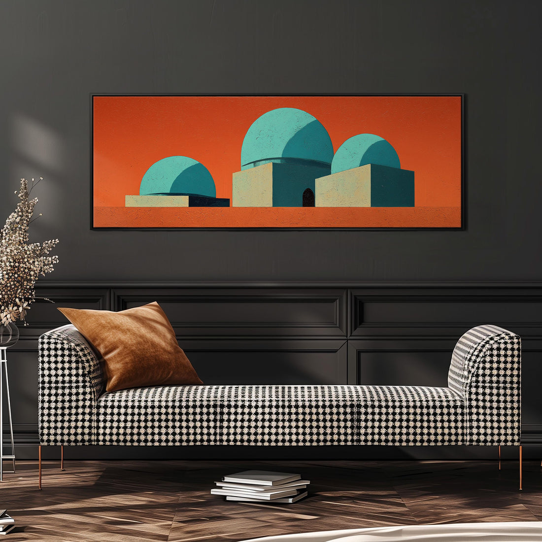 a large, abstract painting of three domes in shades of blue and orange, hanging on a wall above a brown sofa.