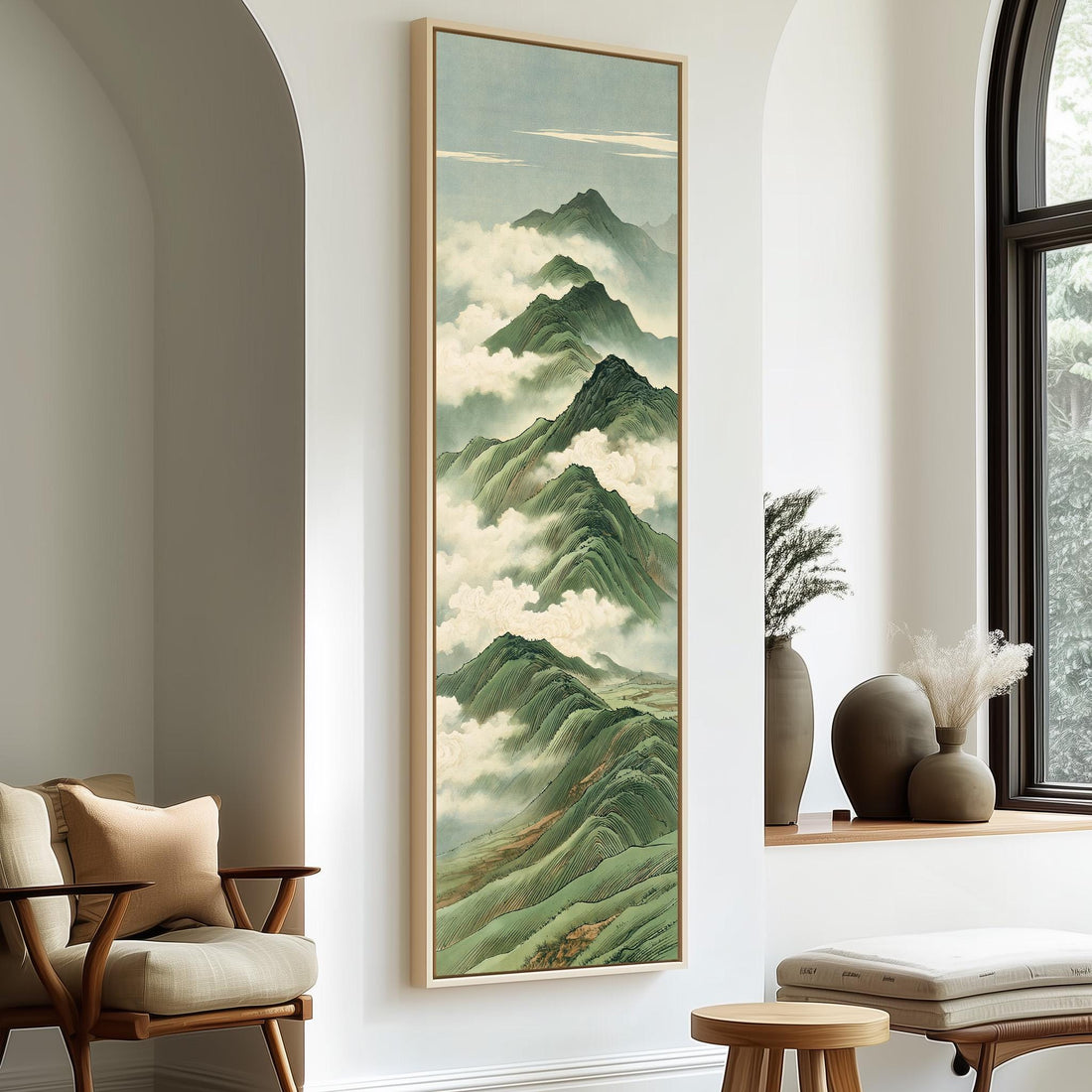 Green mountain peaks rising through clouds long vertical canvas print in a sunlit living space