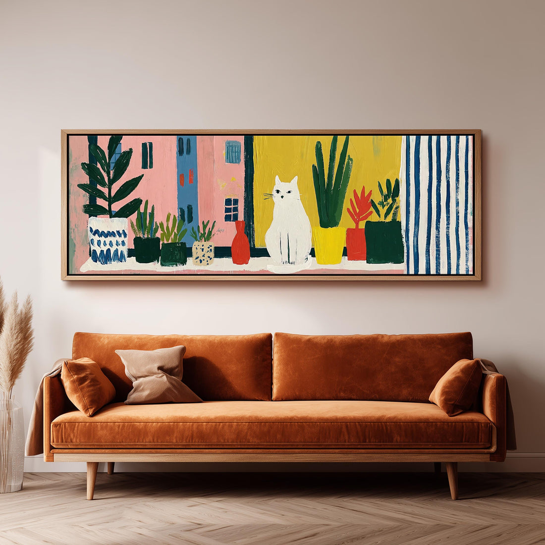 White cat on a sunny balcony with plants long horizontal canvas print above a sofa in a living room