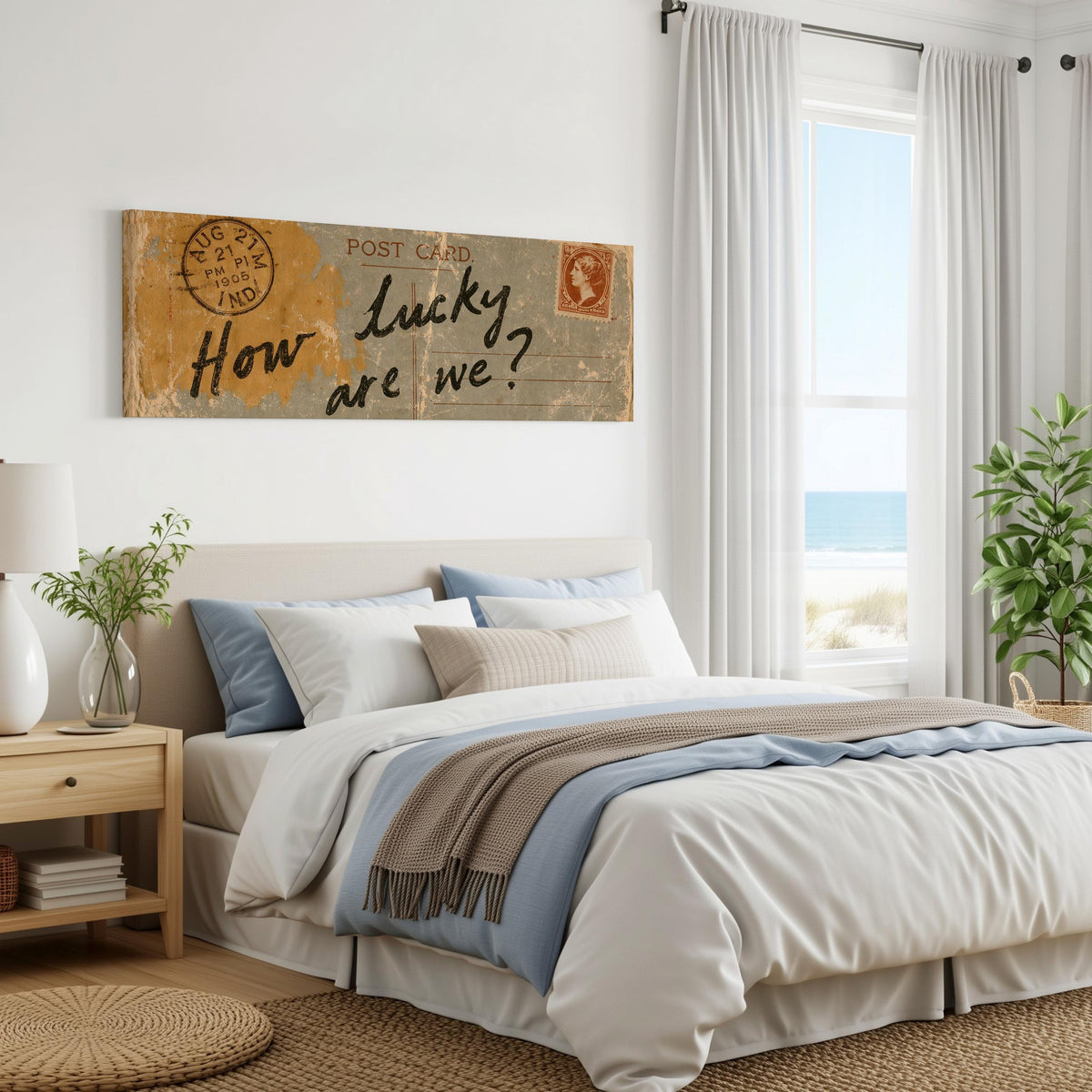 Vintage postcard saying how lucky are we panoramic canvas print above a bed in a coastal bedroom