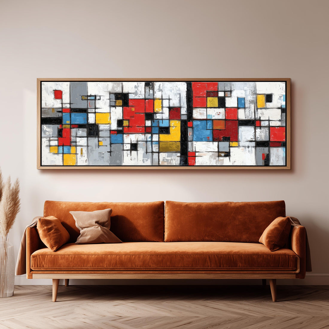 a modern living room with a black and white checkered sofa, a stack of books, and a large abstract painting hanging on the wall above the sofa.