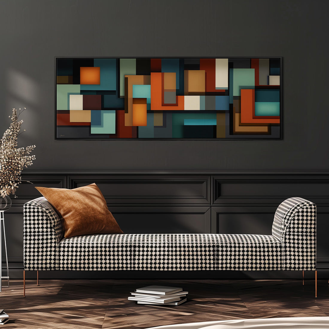 a modern living room with a black and white checkered sofa, a stack of books, and a large abstract painting on the wall.
