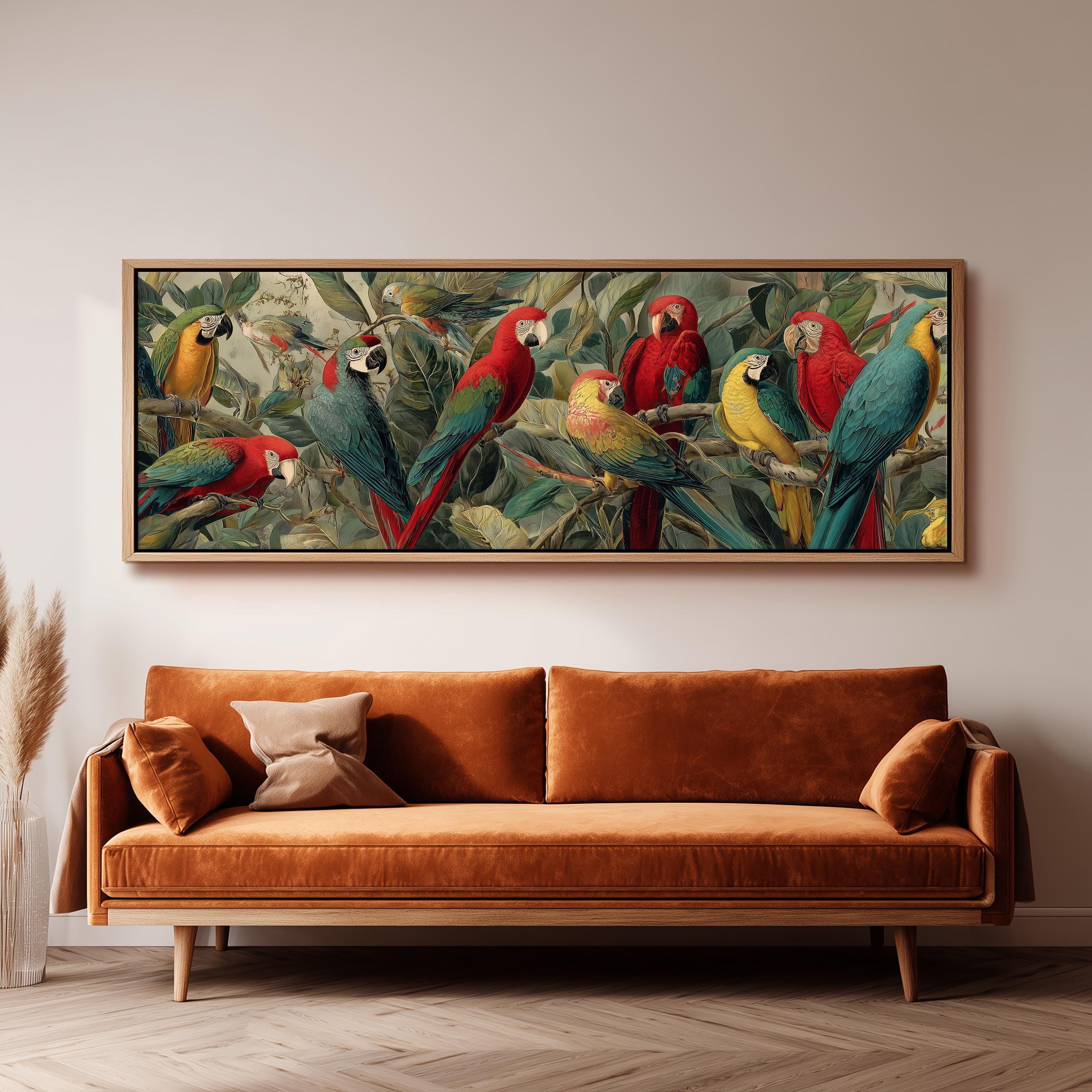 a large, colorful painting of parrots perched on branches, hanging on a wall above a brown sofa.