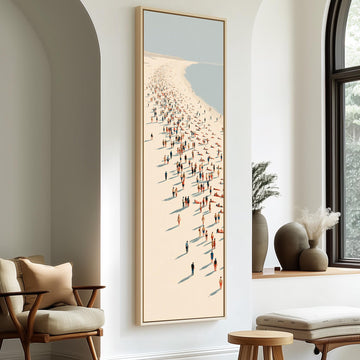 Beach walkers along a diagonal shoreline long vertical canvas print in a sunlit living space