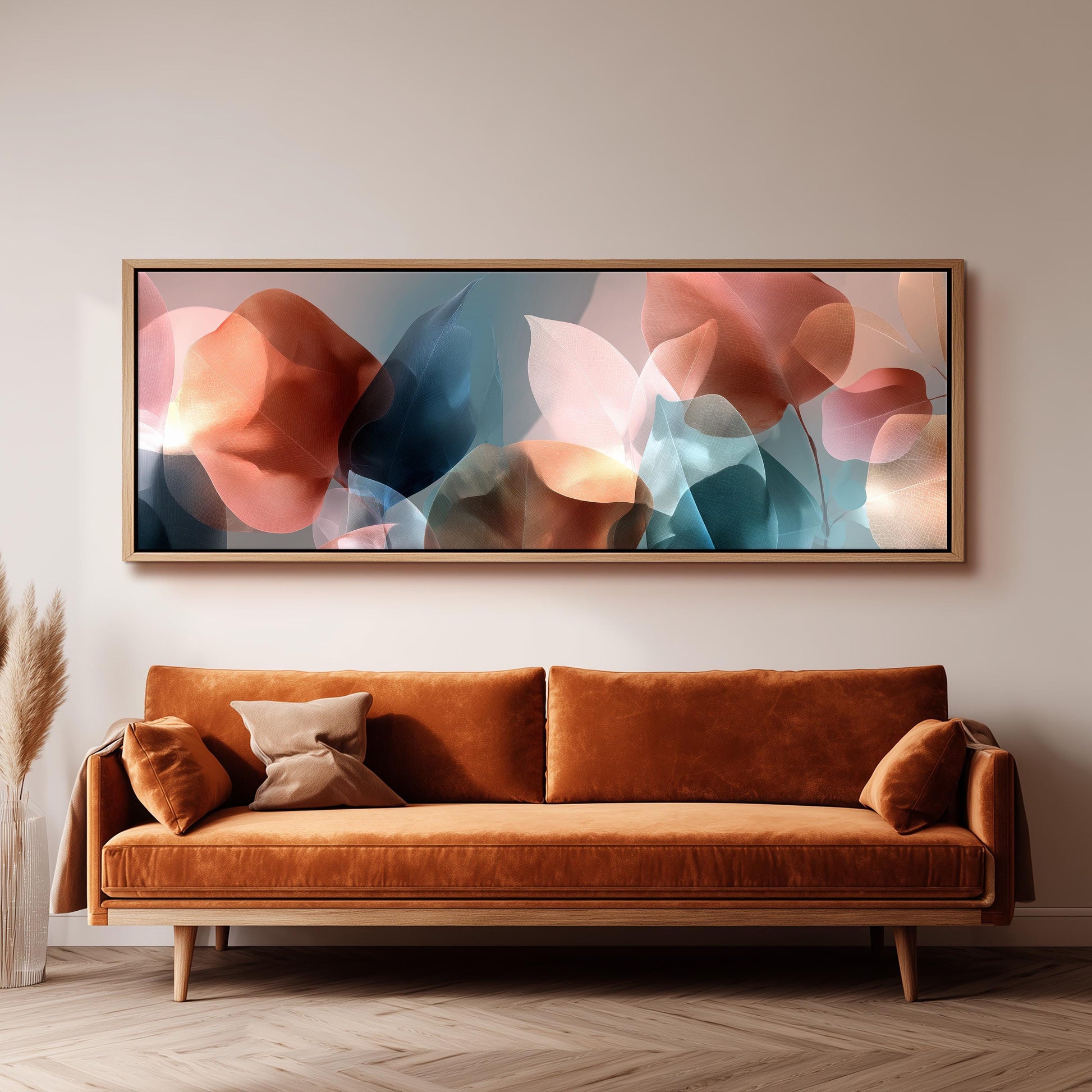 a large abstract painting hanging on a wall above a brown sofa with two pillows.