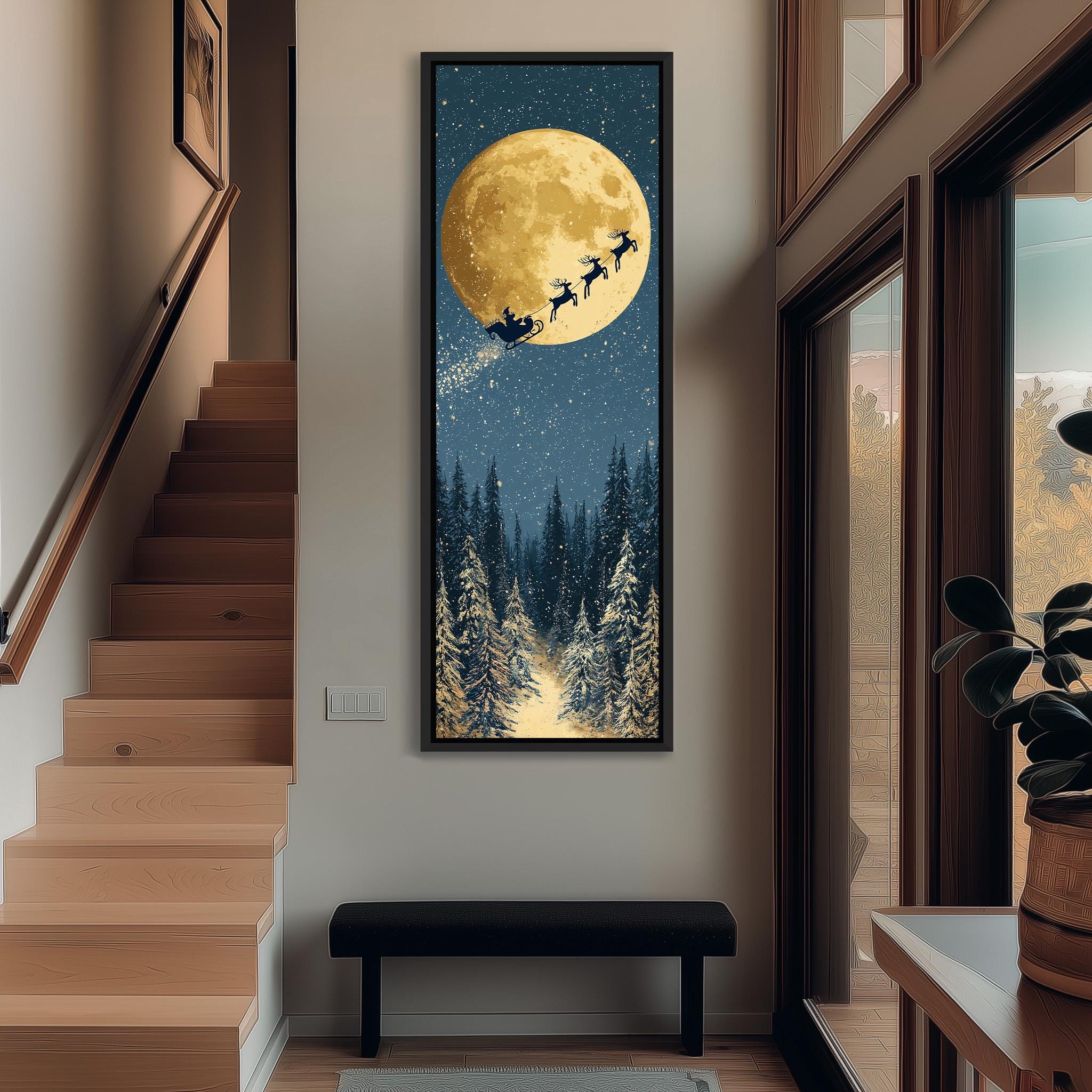 a large, framed picture of Santa Claus flying on a sleigh with reindeer against a night sky with a full moon.