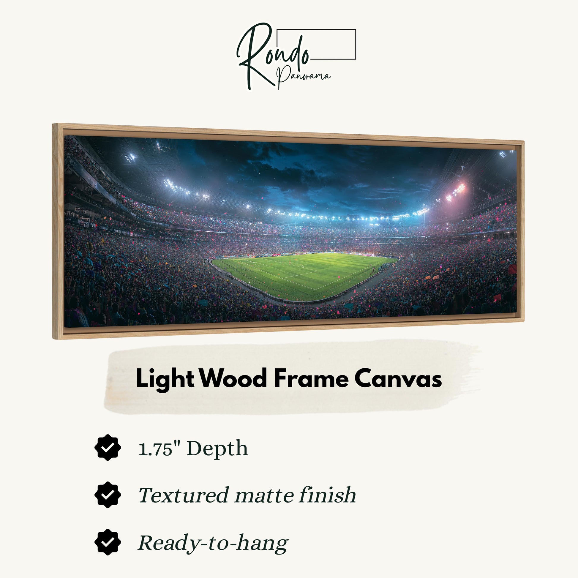 A framed canvas depicting a large, brightly lit stadium with a crowd of spectators.